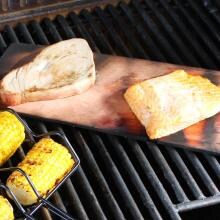 Outset Assorted Grill Planks Shown With Food