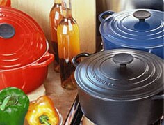 enamel cast iron cookware on the counter