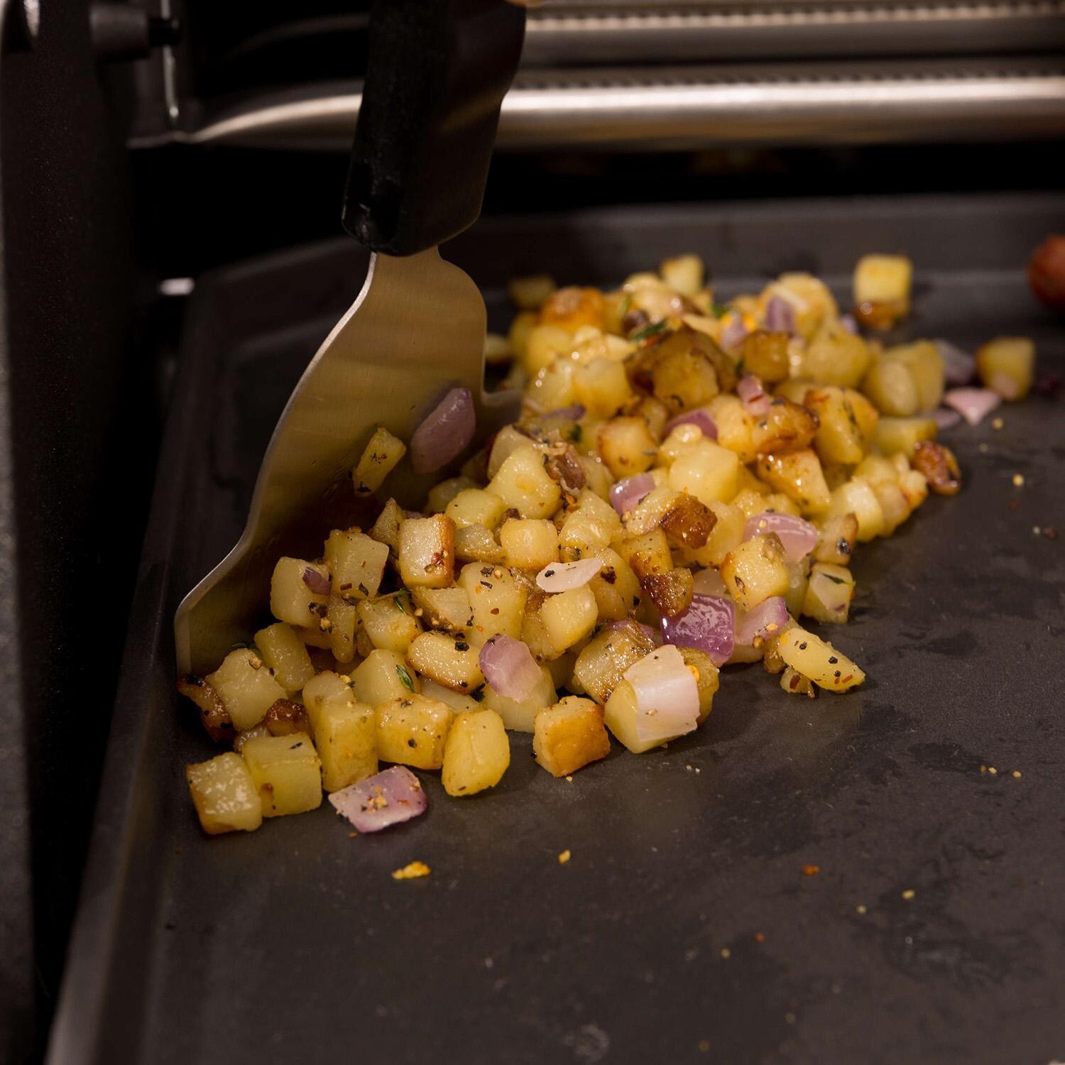 Broil King Plancha Grill Scraper - 64039 - In Use on Food - Lifestyle thumbnail