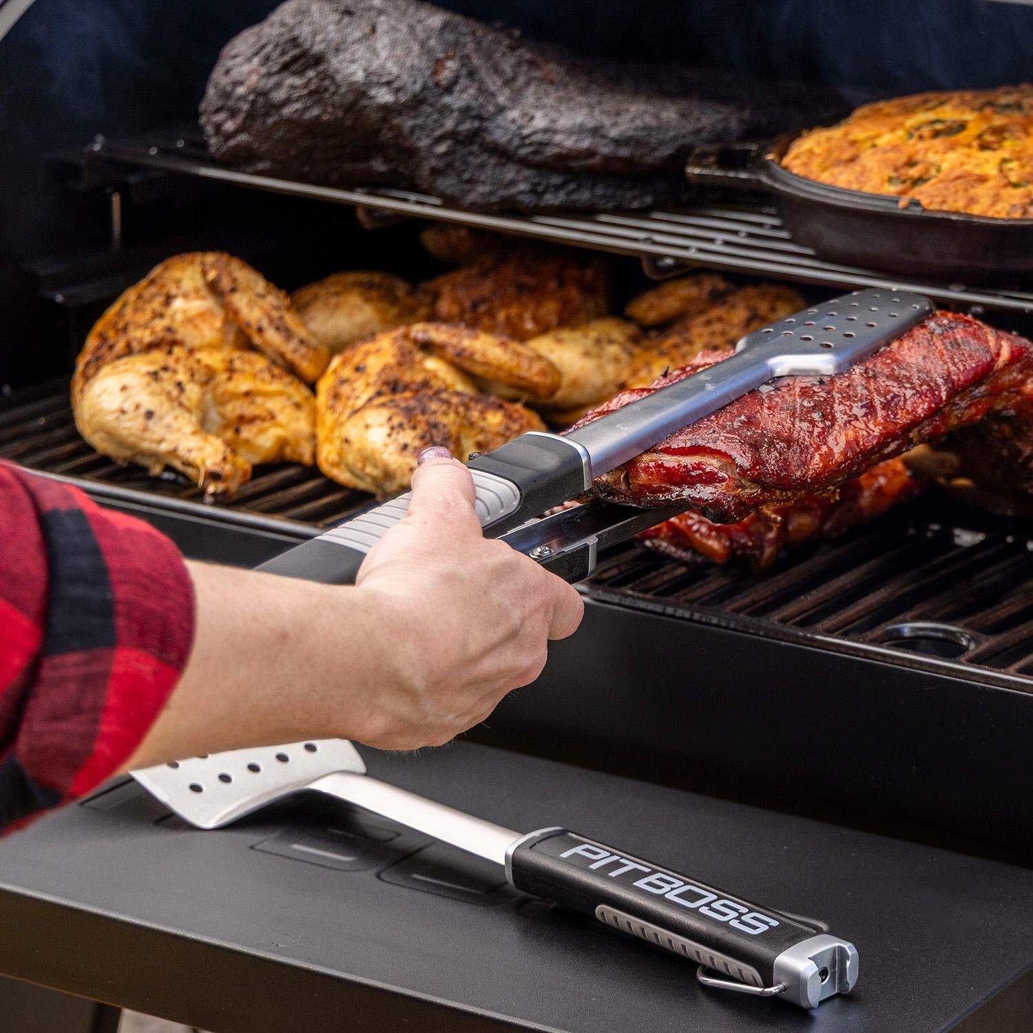 Pit Boss 11106 Sportsman 850 Pellet Grill w/ WiFi - Flipping Meat - Detail