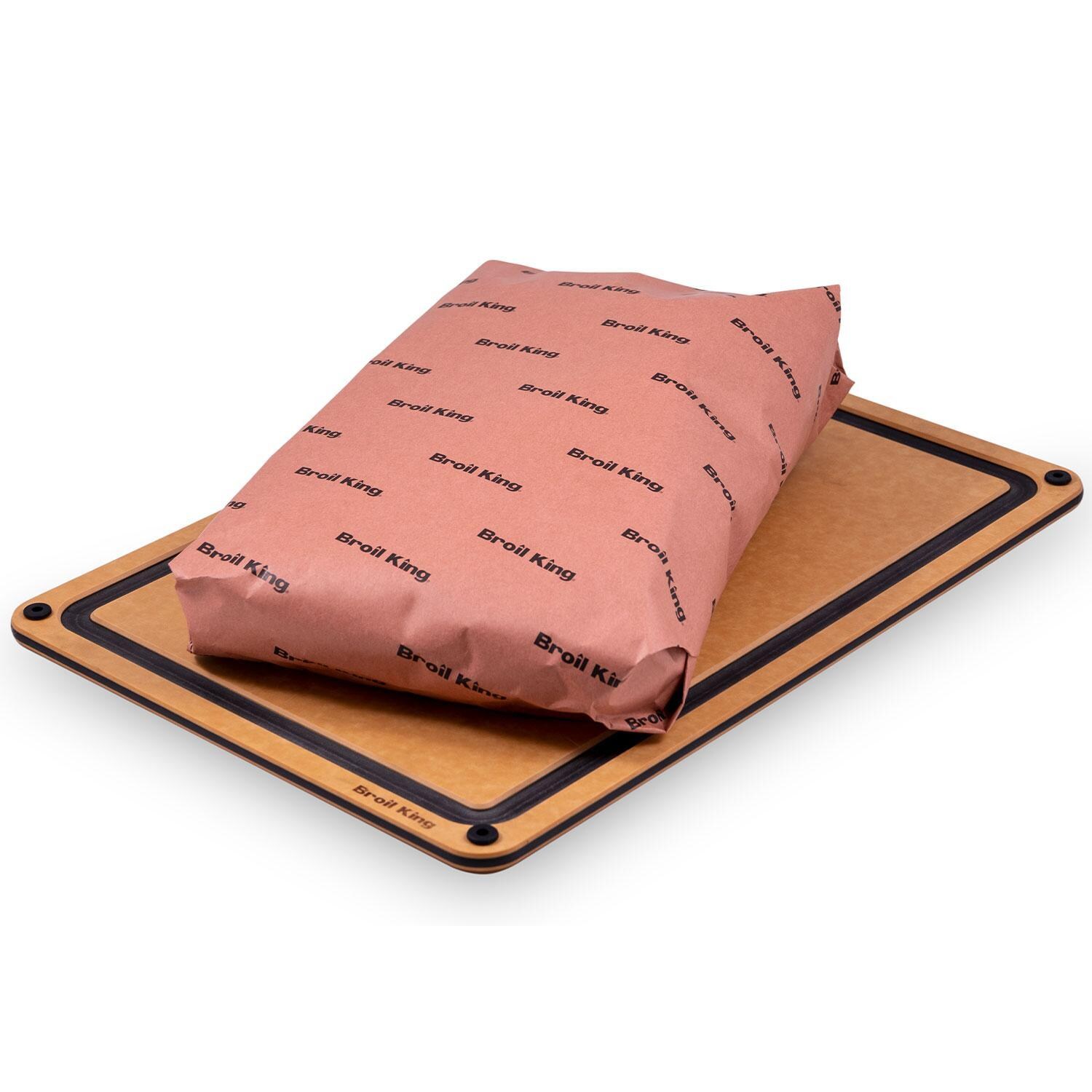 Broil King 69600 Butcher Paper - Food Wrapped on Cut Board - White Background thumbnail