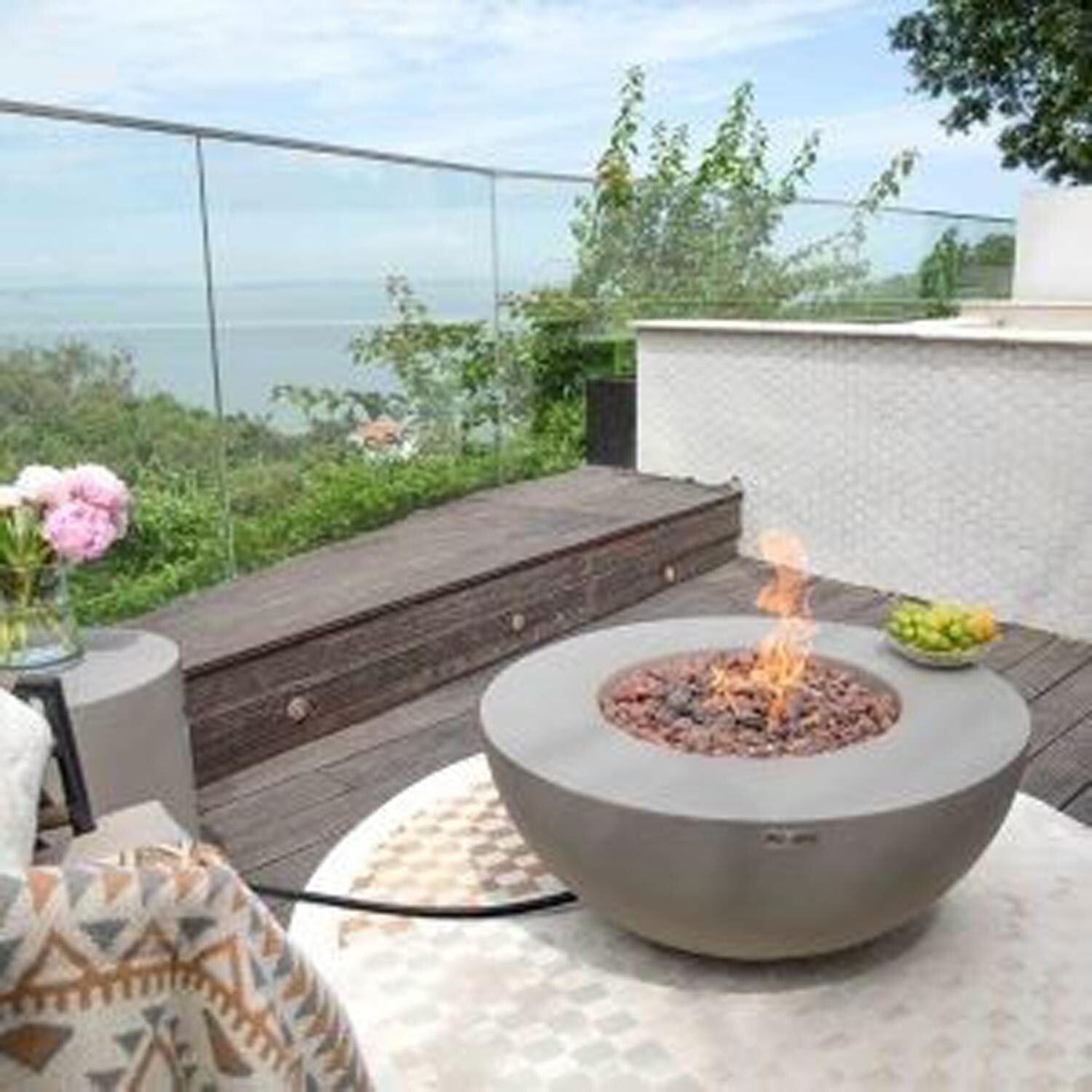 Roca OFG107-NG 34 Inch Round Concrete Natural Gas Fire Pit Table in Gray By Elementi - Balcony - Side View - Lifestyle thumbnail