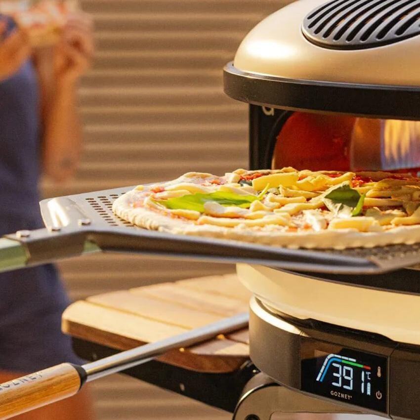 Gozney AD1934 Pro Placement Peel - XL - Inserting Pizza in Oven - Lifestyle thumbnail