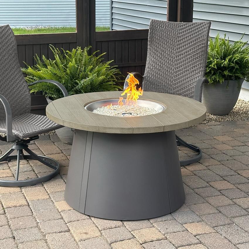 Cirvalo 41 Inch Round Natural Gas Fire Pit in Smokey Oak/Charcoal by The Outdoor GreatRoom Company - Lifestyle thumbnail