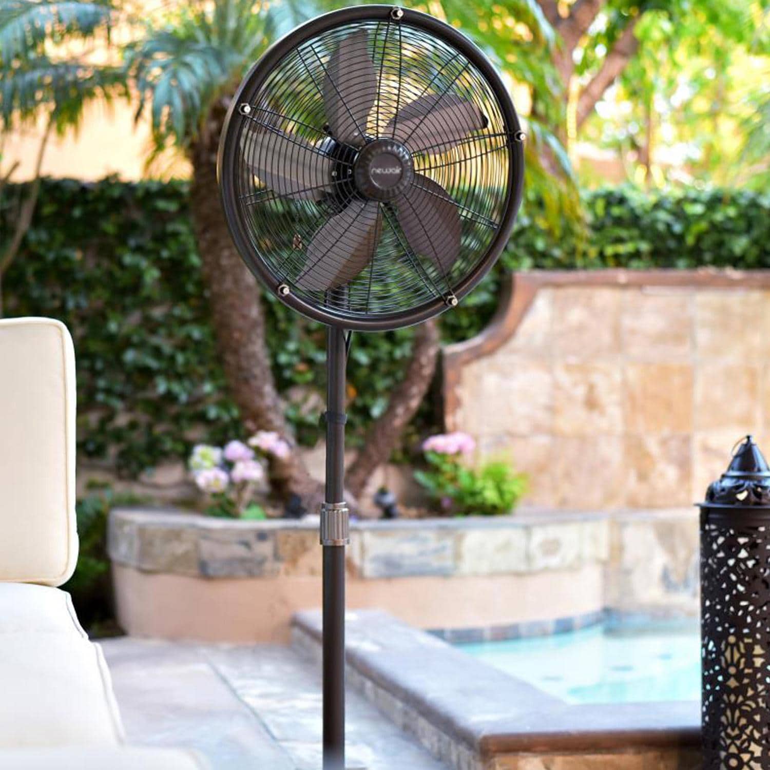 NewAir AF-600 18-in Misting & Oscillating Pedestal Fan for Indoor & Outdoor w/ Adjustable Height & Head Tilt - 2800 CFM - On Patio Up Close - Lifestyle thumbnail