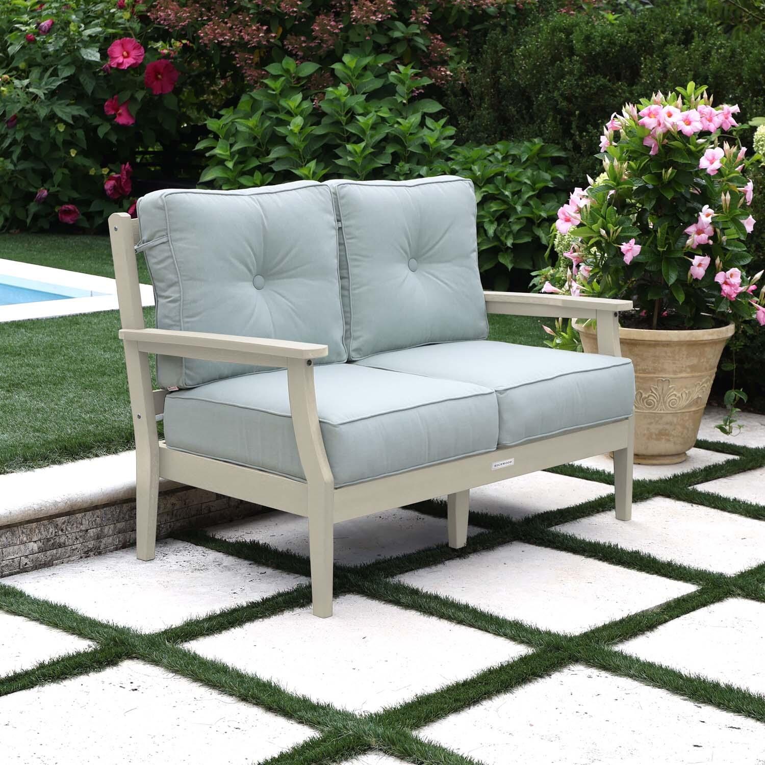 Blushing Bay 2 Person Recycled Plastic Loveseat in Canvas Seasalt/Whitewash by Lakeview Outdoor Designs - Left Angled - Lifestyle thumbnail