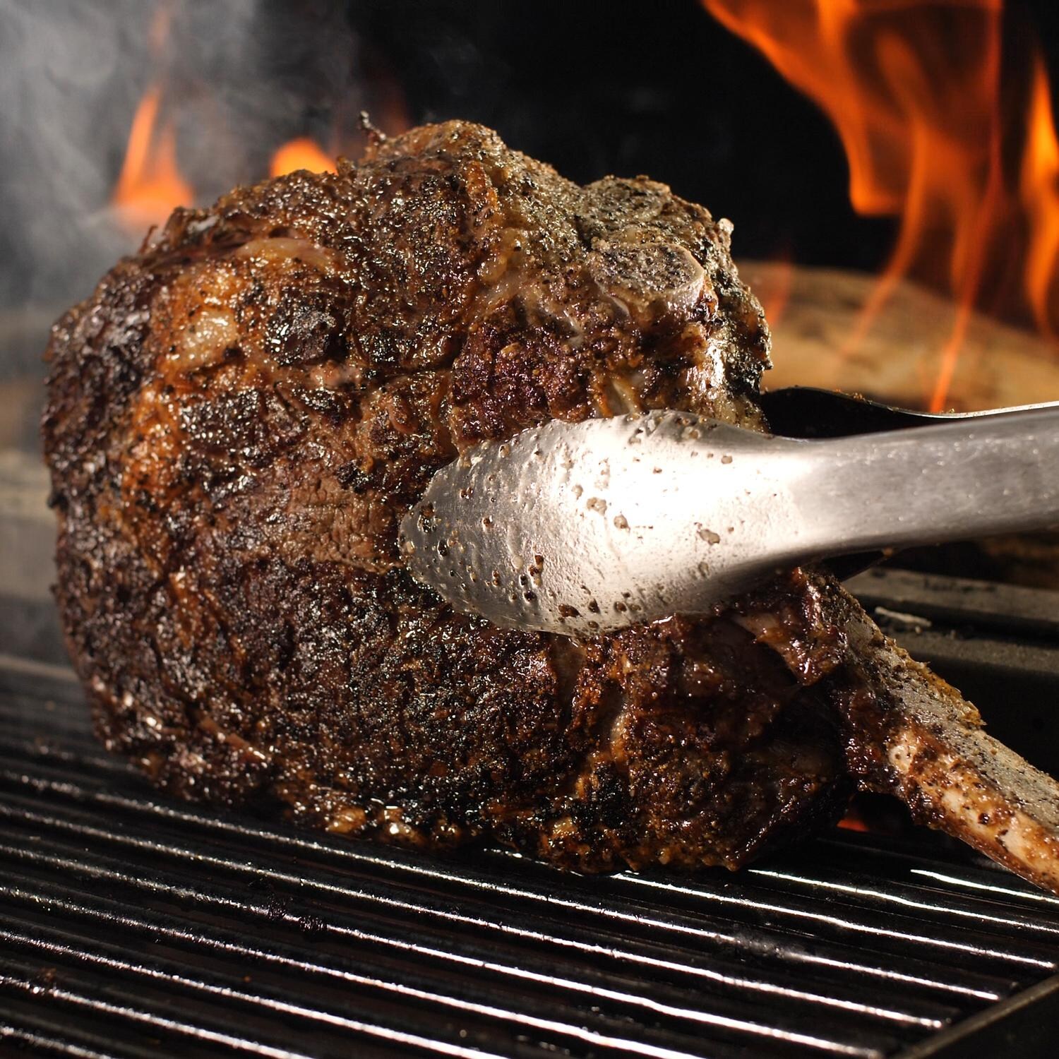 Nuke DELTACT02 47-Inch Argentinian-Style Countertop Gaucho Grill - Tomahawk Steak Closeup thumbnail