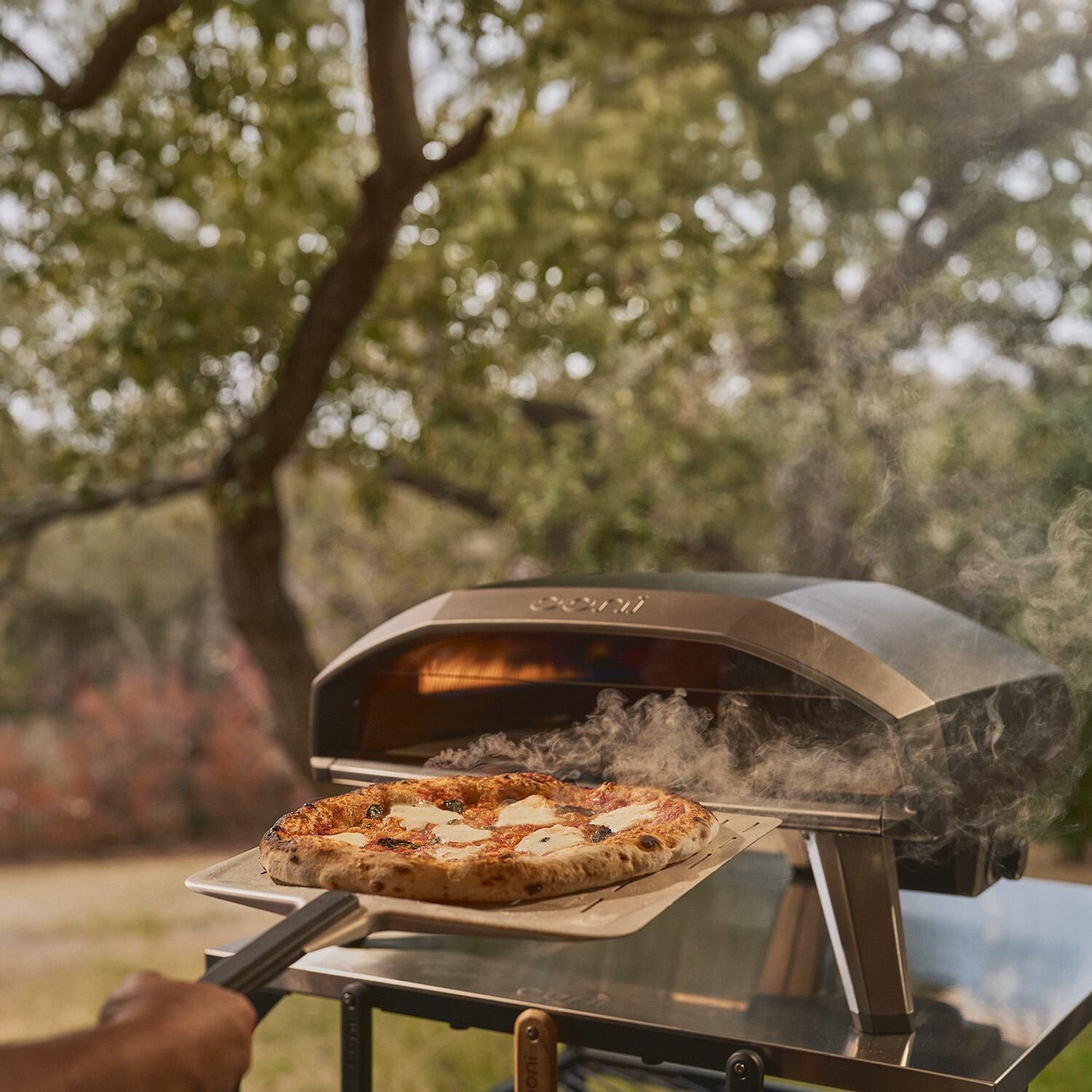 Ooni UU-P33A00 Koda 2 Pro 18 Inch Propane Portable Pizza Oven - Blue - Shown in Black - Lifestyle thumbnail