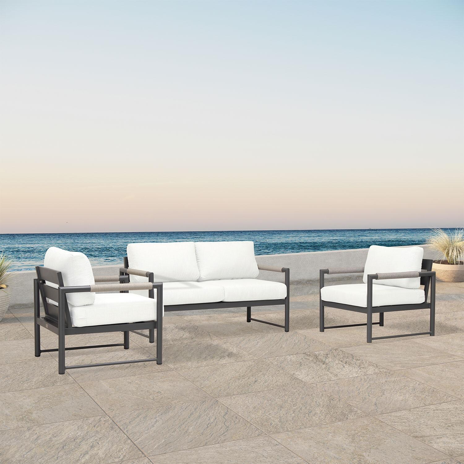 Lakeview AVEBAY-SL-PG-SET120-CN Avenue Bay Slate/Pebble Gray 3 Pc Loveseat Set - Canvas Natural - Angled On Patio - Lifestyle thumbnail