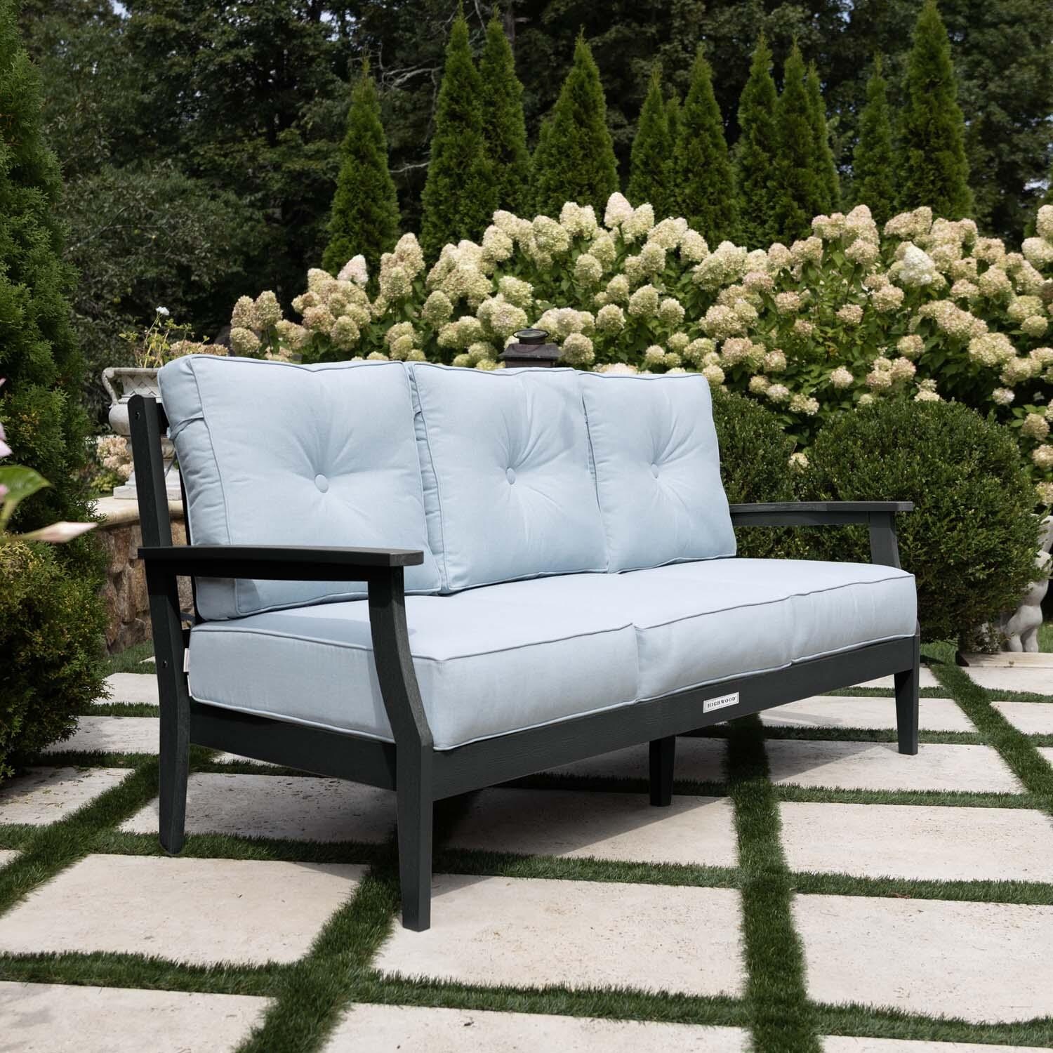 Blushing Bay 3 Person Recycled Plastic Sofa in Bliss Dew/Black by Lakeview Outdoor Designs - Side View - Lifestyle thumbnail