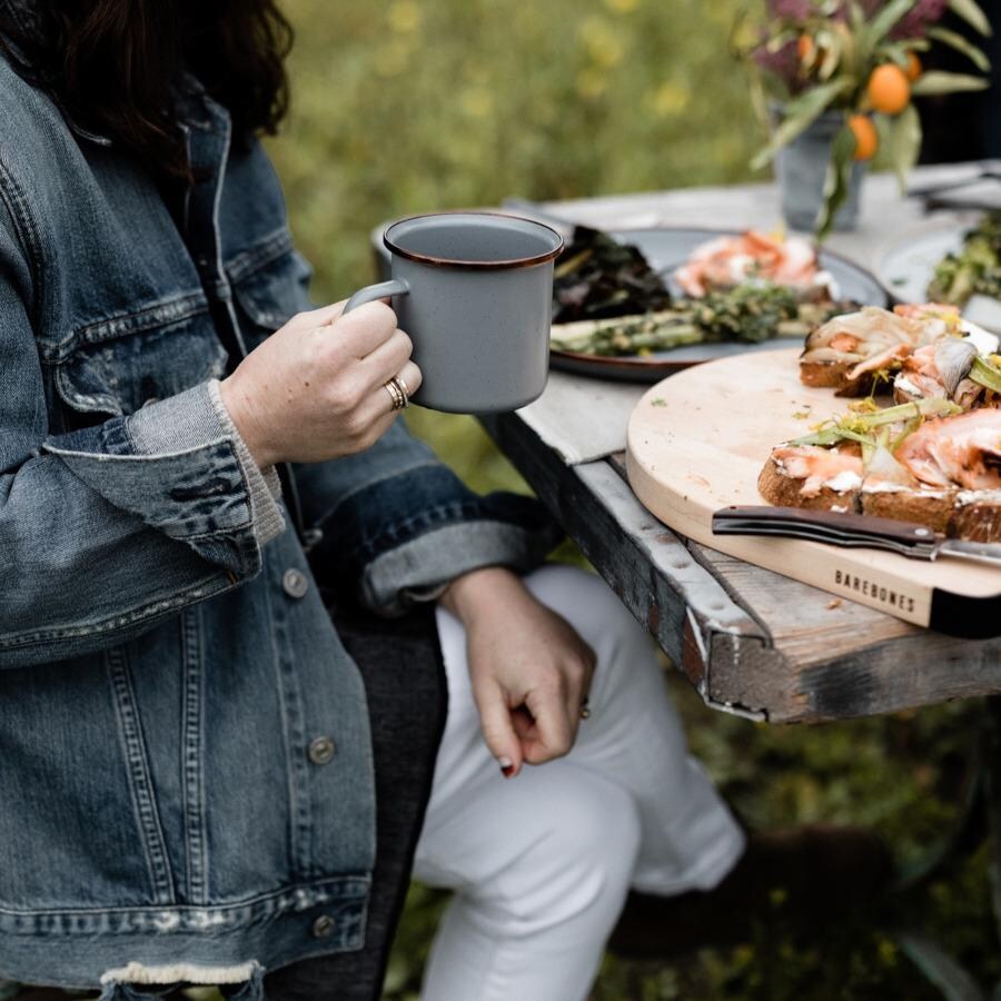 Barebones Living BND-1343 Enamel Dining Set - 16pc - Slate Gray - Holding Mug - Lifestyle thumbnail