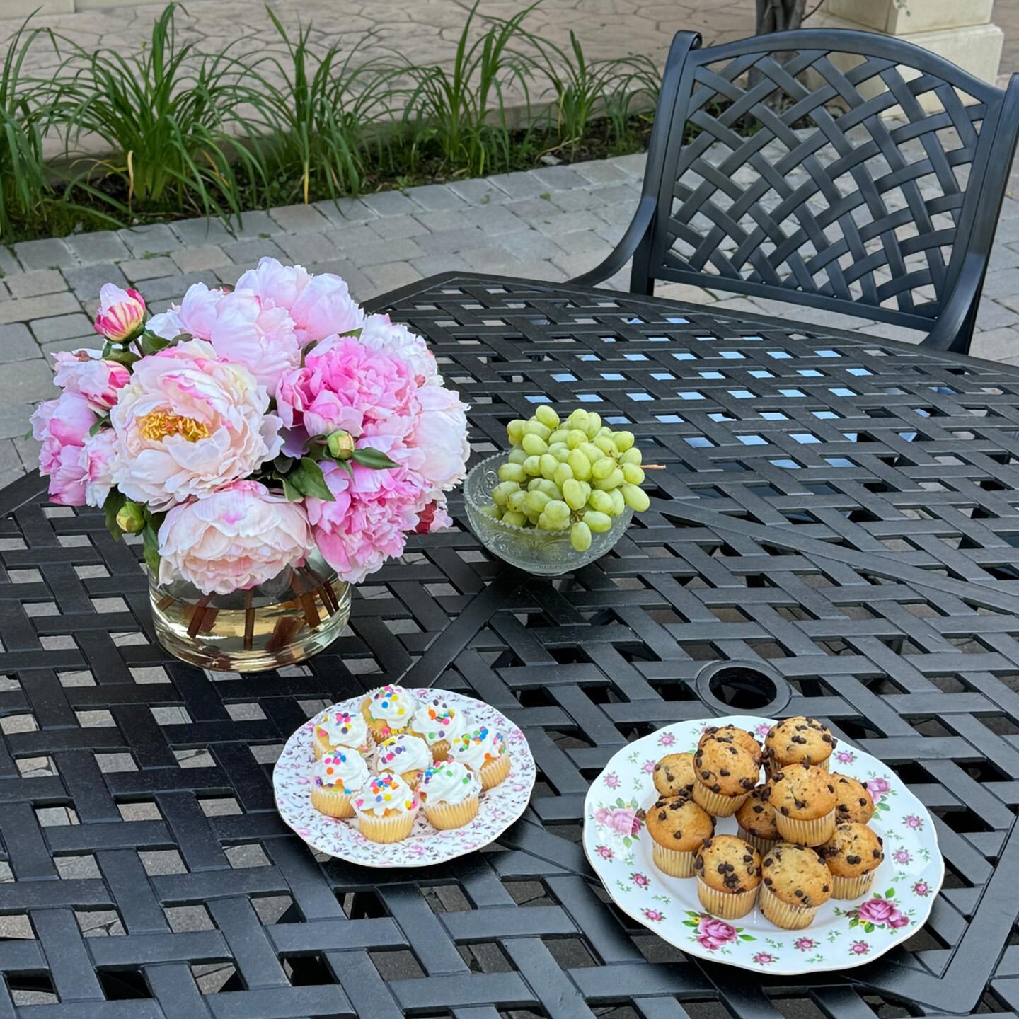Darlee B/DL13-9PCAR-30W-B Nassau 9 Pc Cast Aluminum Dining Set in Antique Bronze w/ Blue Cushions - Table w/ Flowers - Lifestyle thumbnail