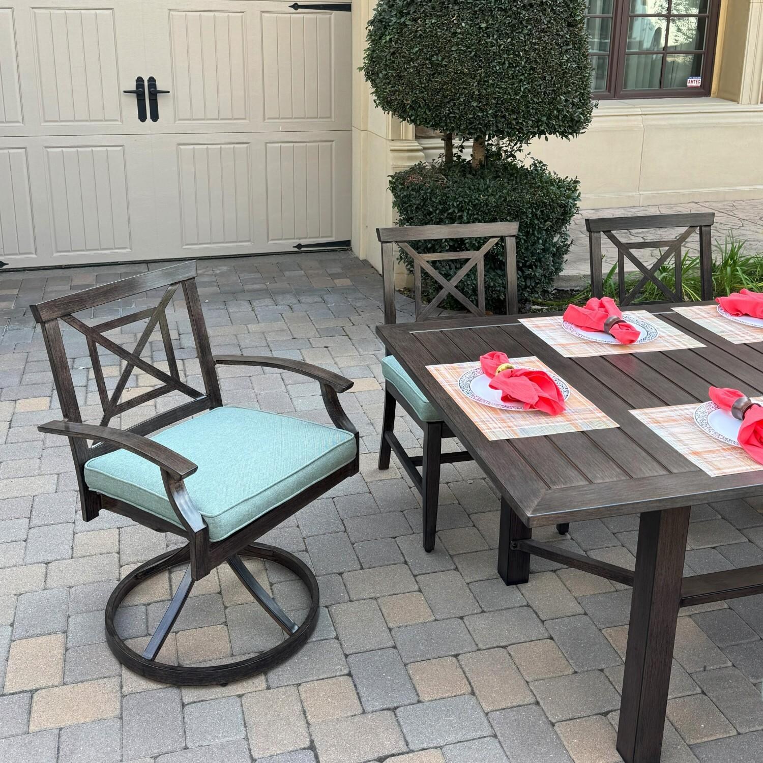 Atlantis 9 Pc Aluminum Dining Set w/ 4 Dining Side Chairs, 2 Swivel Rocker Dining Arm Chairs, 2 Two Person Benches & Extension Table in Walnut/Spa by Darlee - Chair At Table - Lifestyle thumbnail