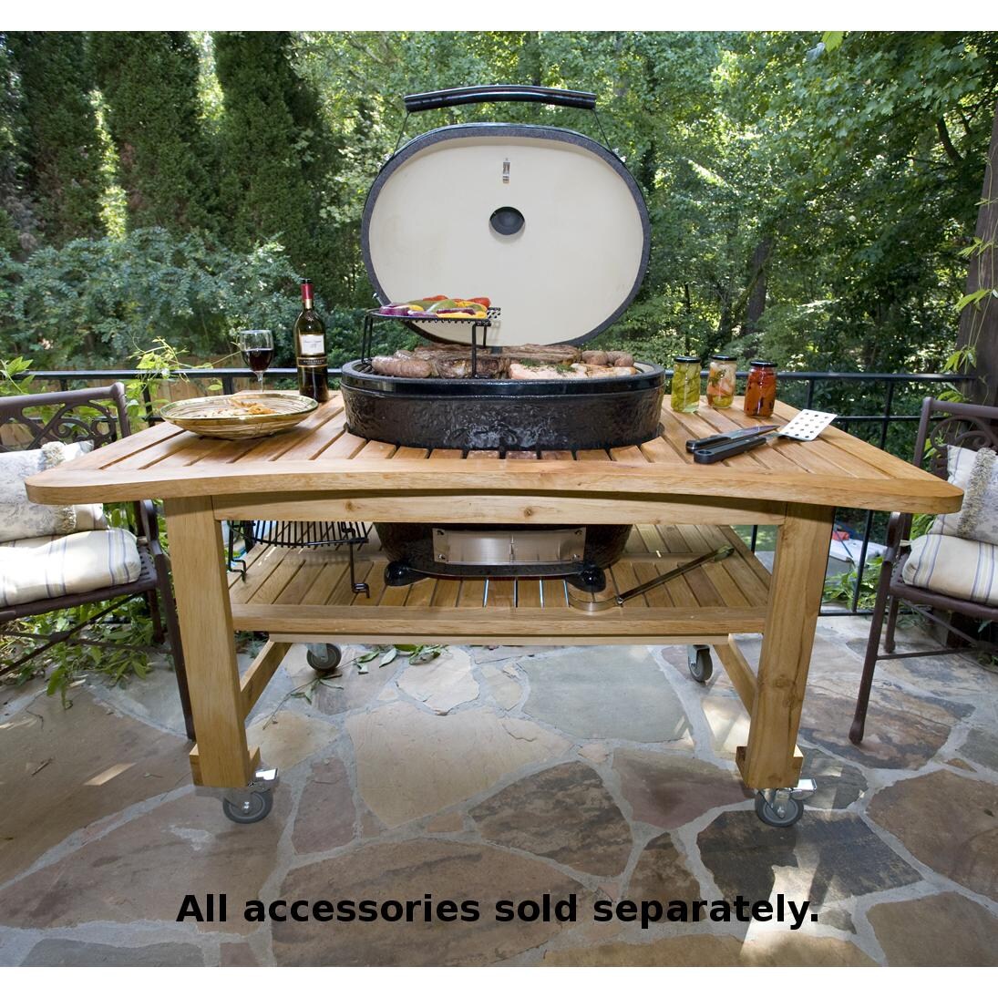Primo Oval XL Ceramic Charcoal Smoker Grill On Teak Table - On Patio thumbnail