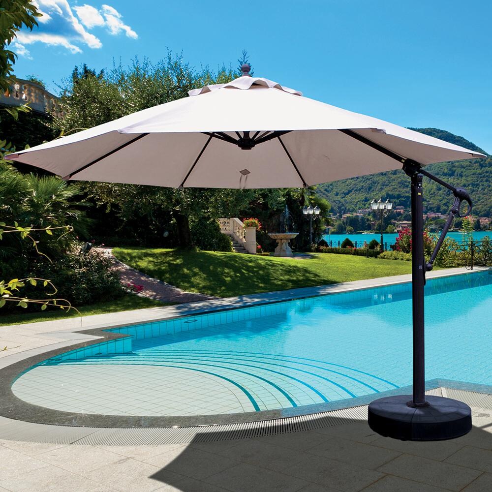Galtech 11 Ft. Octagonal Patio Umbrella W/ Manual Lift - Lifestyle View Shown In Antique Bronze Finish W/ Natural Sunbrella Fabric thumbnail