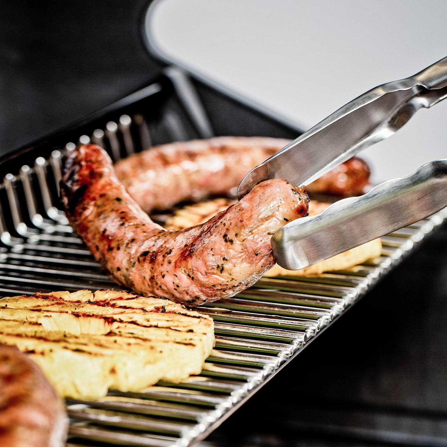 Broil King 956317 Regal S420 Pro 25-Inch Natural Gas Grill -Sausage on the Warming Rack - Lifestyle thumbnail