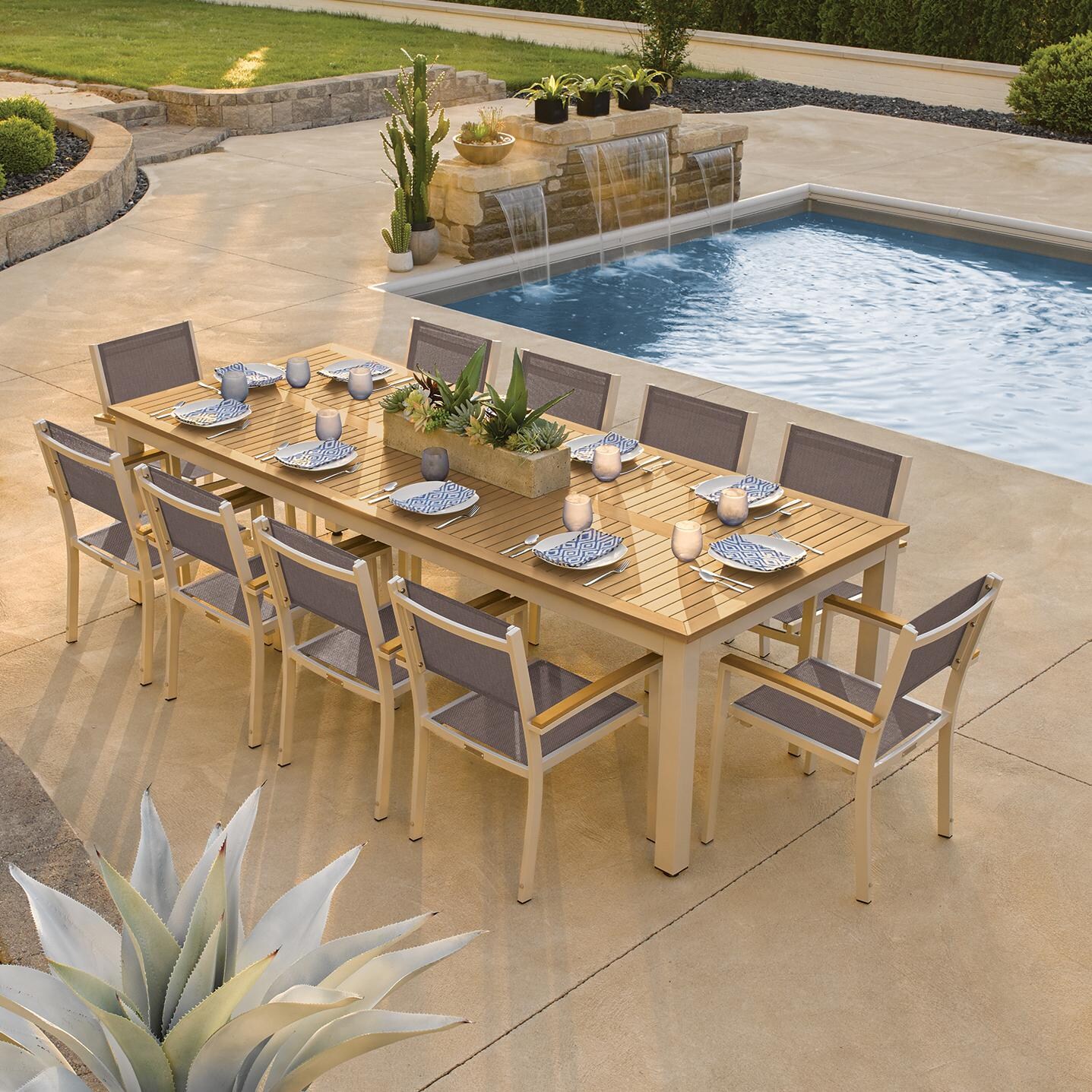 Travira 11 Piece Aluminum Patio Dining Set W/ 103 X 42 Inch Table and Tekwood Natural Tabletop By Oxford Garden - On The Patio thumbnail