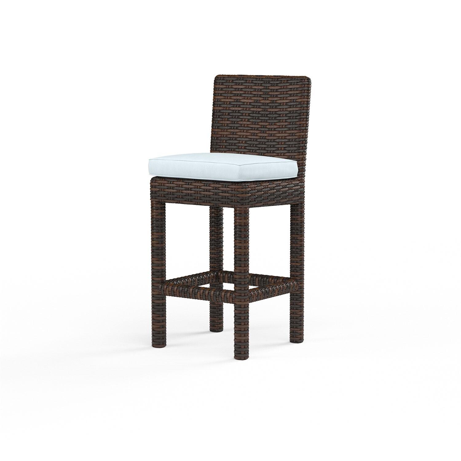 Montecito Wicker Patio Bar Stool in Canvas Skyline w/ Self Welt By Sunset West - Display - White Background thumbnail