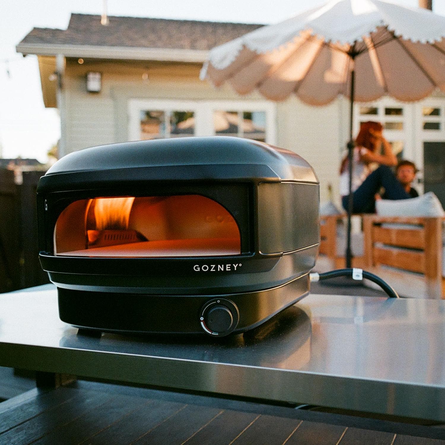 Gozney GAPOBUS1226 Arc Lite Propane Pizza Oven - Black - On Table - Lifestyle thumbnail