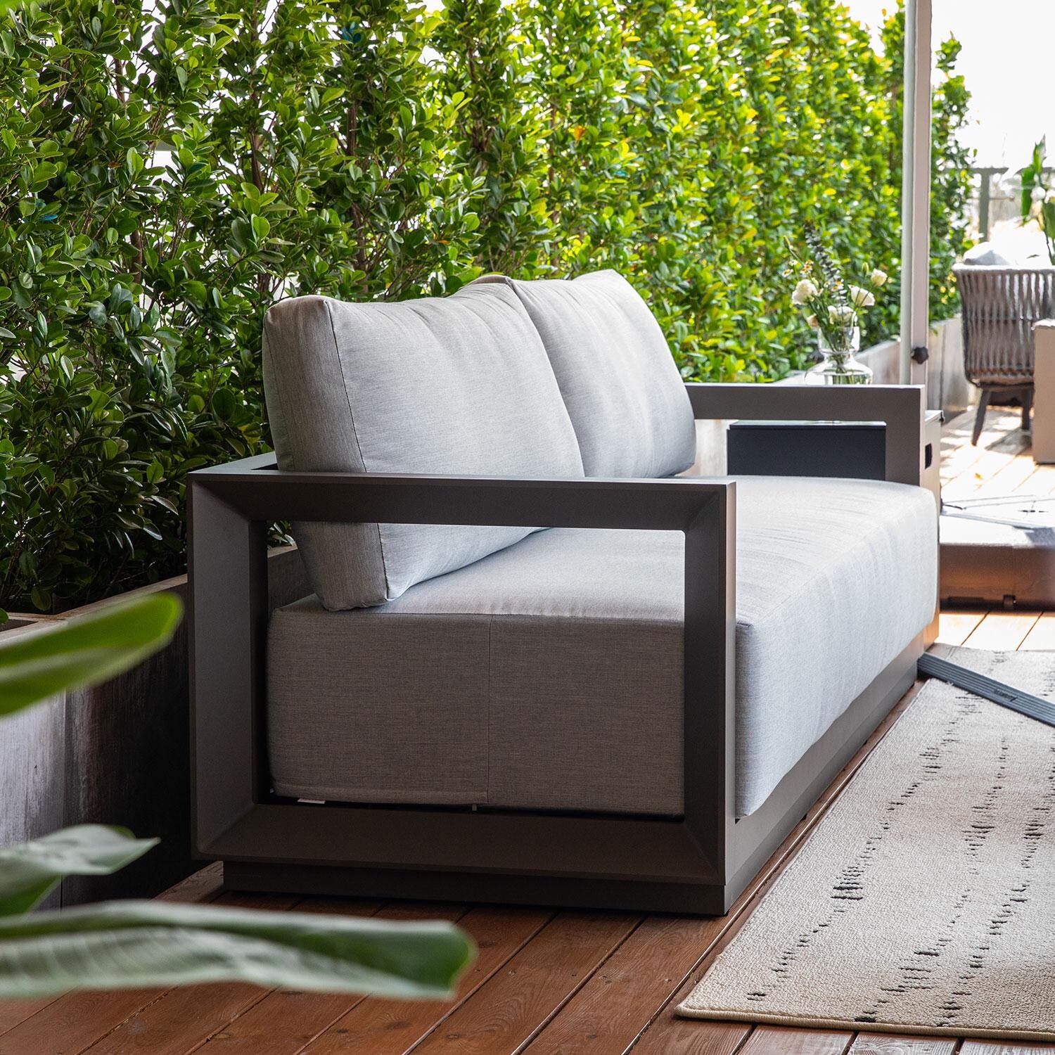 Elementi OS-2505T Newport Outdoor Aluminum Sofa w/ Sunbrella Cushions - Side View - Lifestyle thumbnail