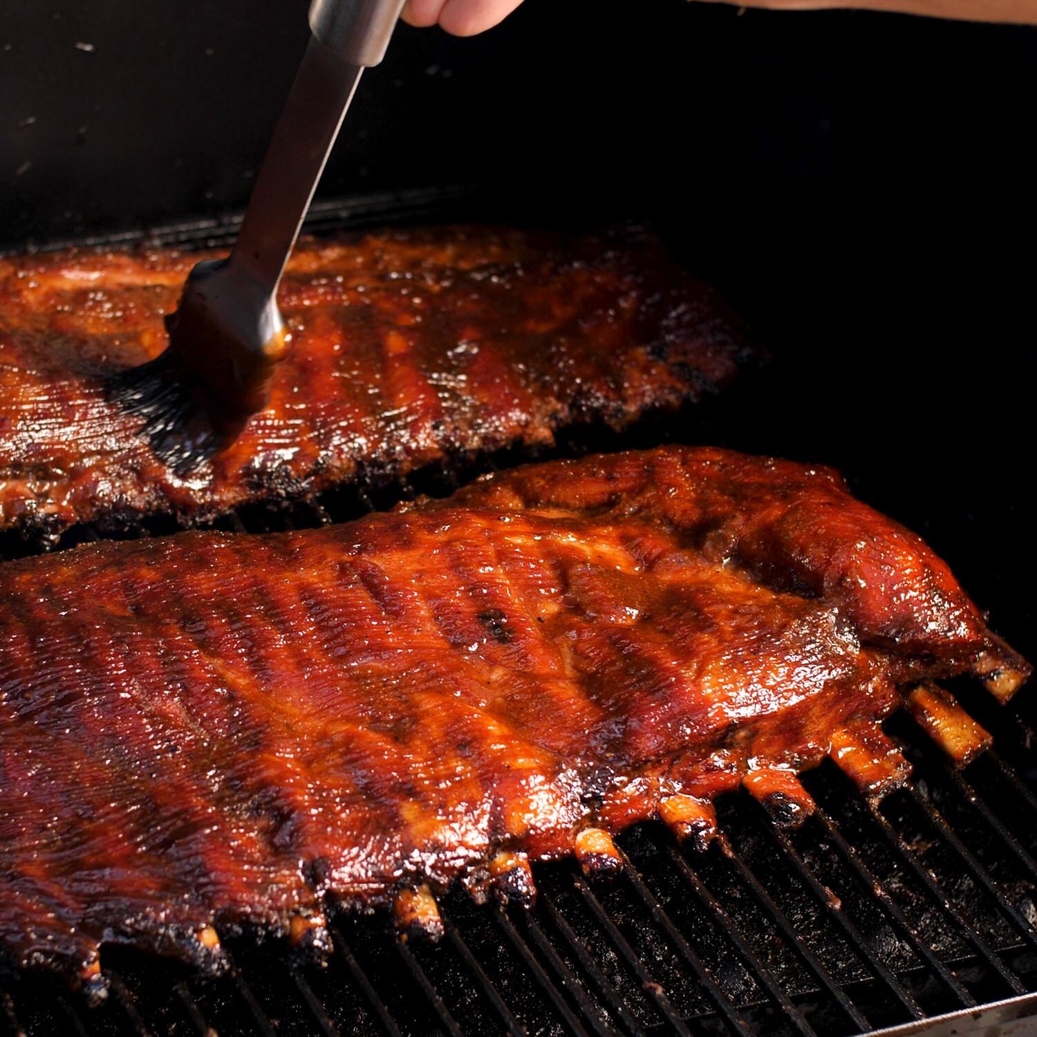 Camp Chef PG24SGWWSK Woodwind SG Pellet Grill With Propane Sidekick - Smoking Ribs thumbnail