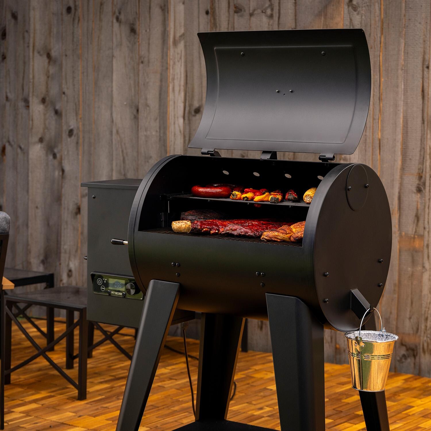 Pit Boss 700FB2 Pellet Grill - Matte Black - Open Angled Left - Lifestyle thumbnail