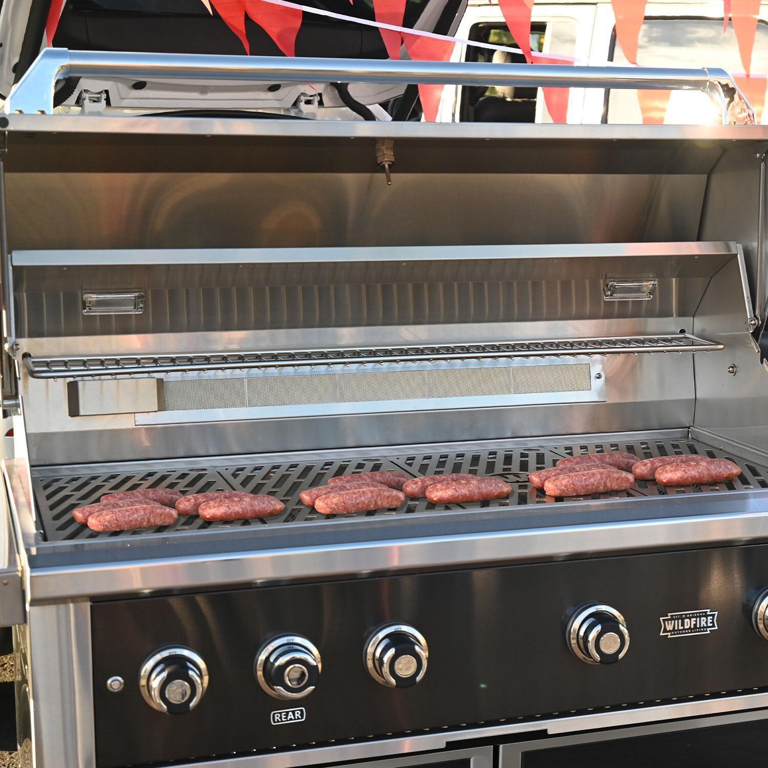 Wildfire Ranch Pro 42-in 304 SS Natural Gas Grill w/ Freestanding Cart - Grilling Hot Dogs - Lifestyle thumbnail