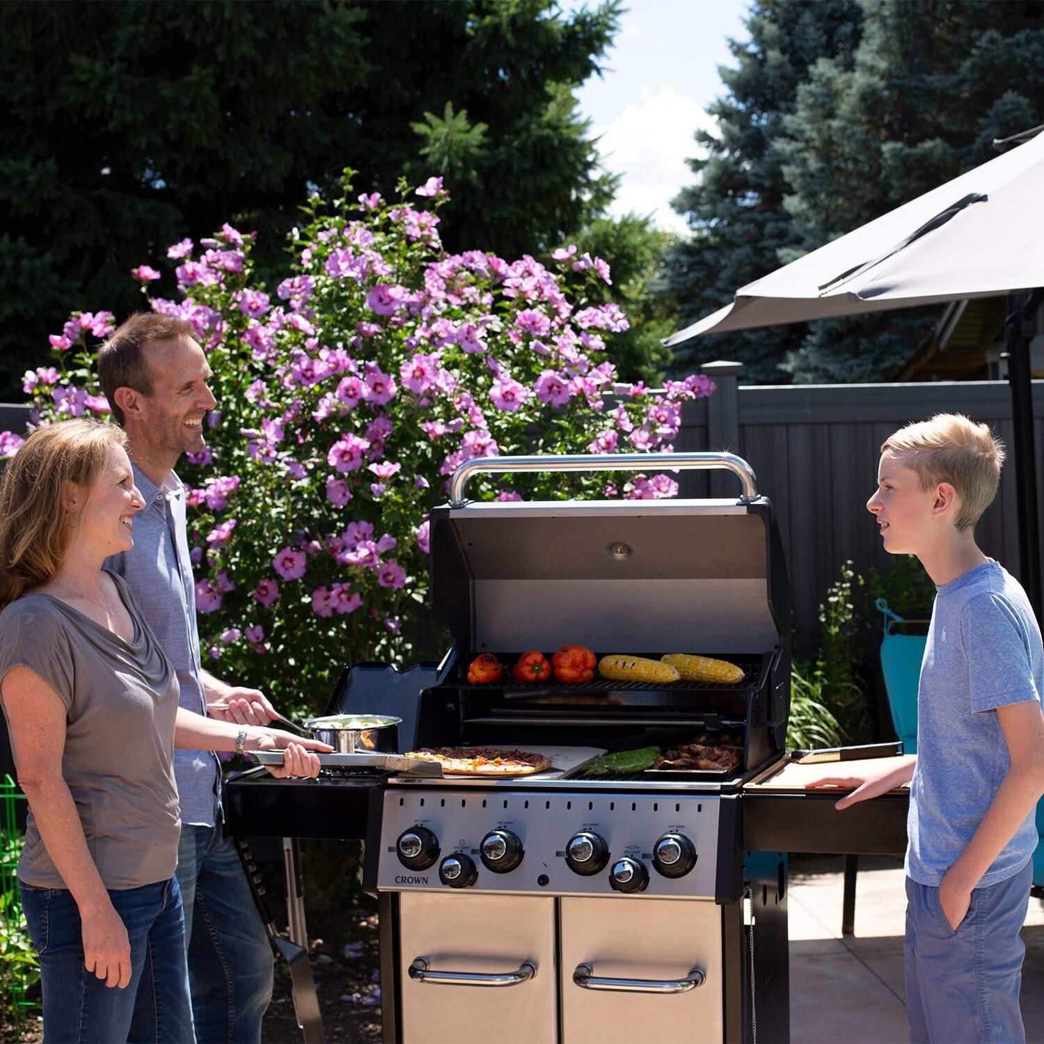 Broil King 865384 24 Inch Crown S490 Propane Gas Grill - Family Gathering - Lifestyle thumbnail