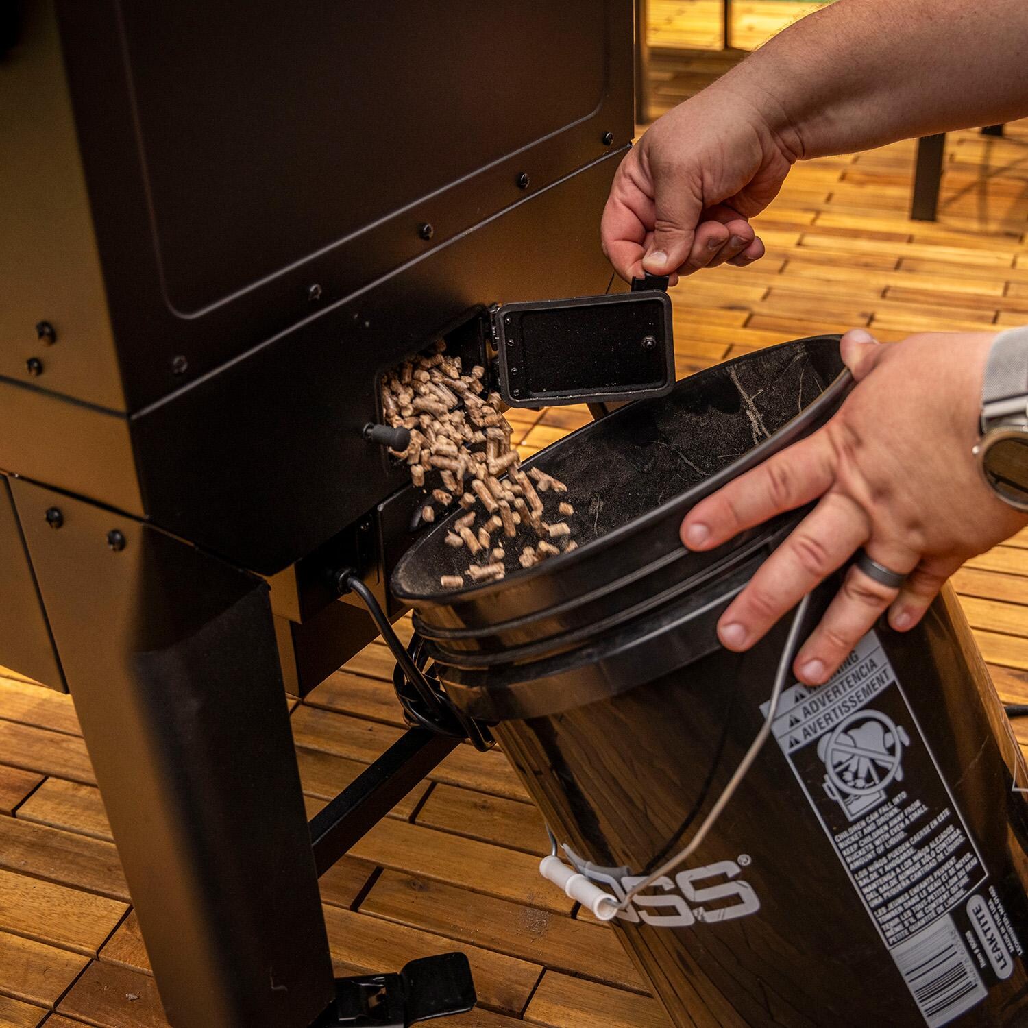 Pit Boss 11114 Navigator 3-Series Vertical Pellet Smoker - Emptying Hopper - Detail thumbnail