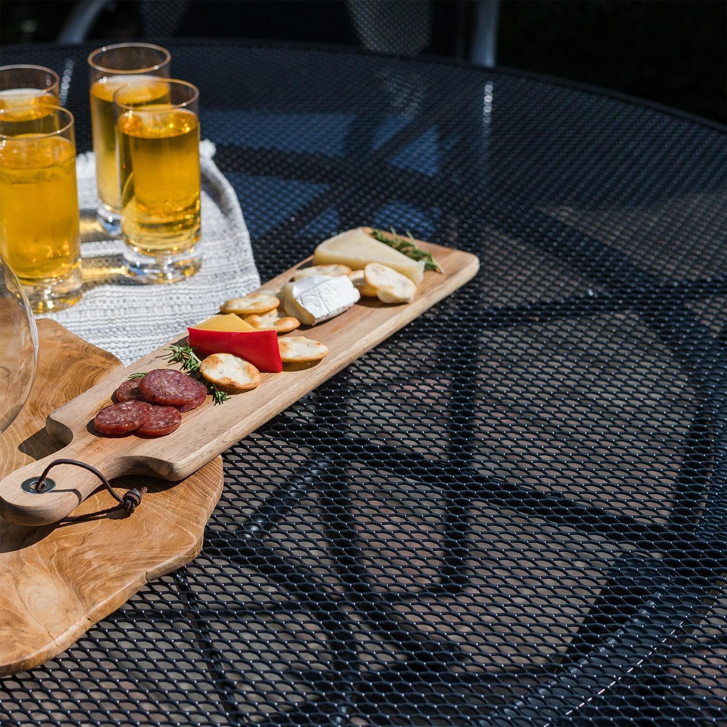 Pilano 7 Pc Steel Round Dining Set in Gray By KETTLER - Food Served on Dining Table - Detail thumbnail