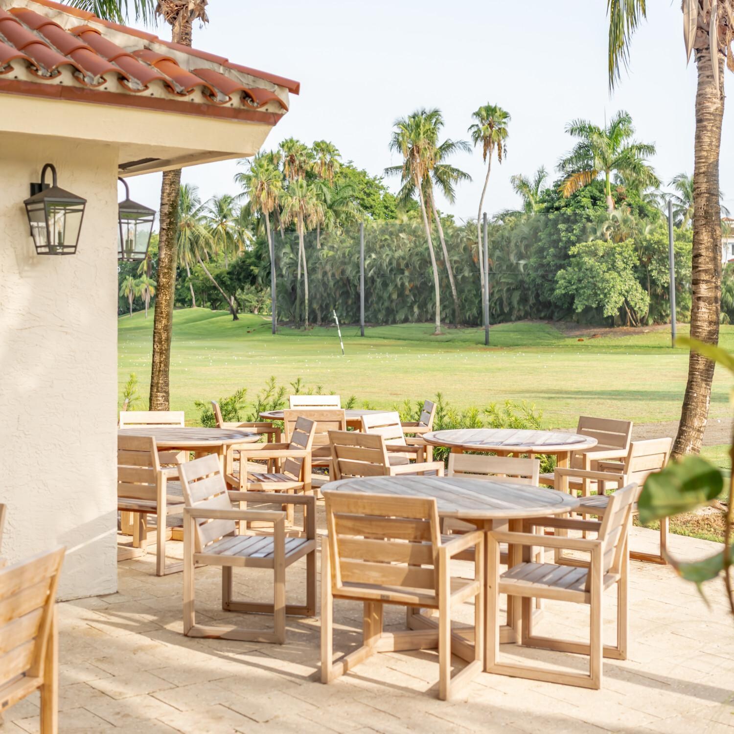 Teak + Table Relax 70 Inch Round Dining Table - Landscape View - Lifestyle thumbnail