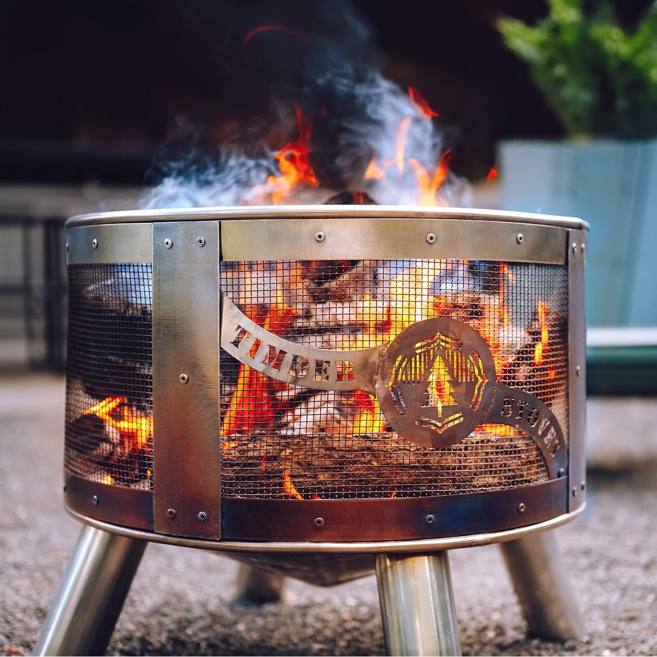 24-in Round Stainless Steel Wood Burning Fire Pit - Up Close - Lifestyle thumbnail