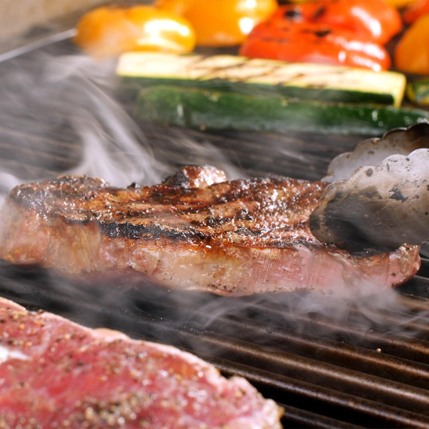 Saber R50SB1517 Elite 1500 32-Inch 3-Burner Built-In Infrared Natural Gas Grill - Grilling Steak thumbnail