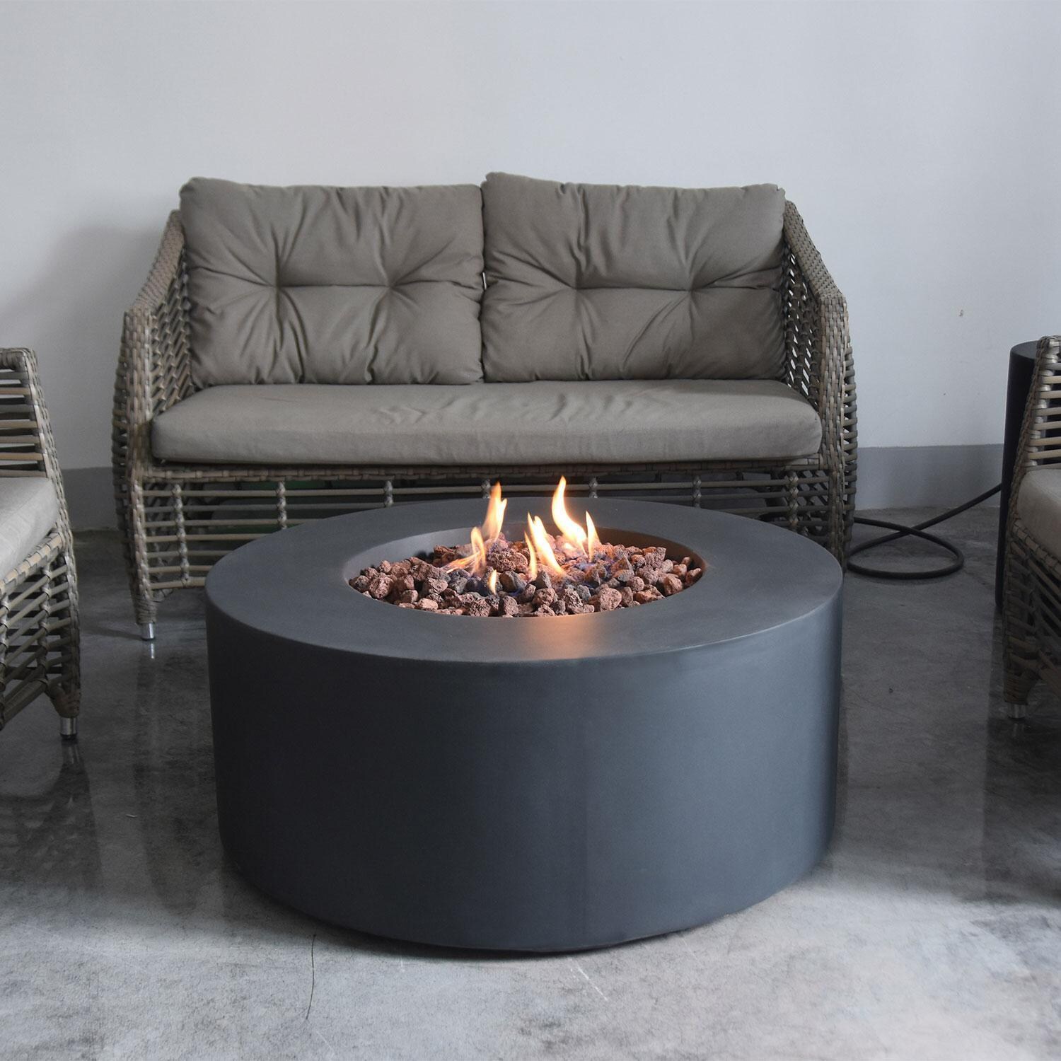 Venice OFG113-NG 34 Inch Round Concrete Natural Gas Fire Pit Table in Black By Elementi - Back Patio - Lifestyle thumbnail