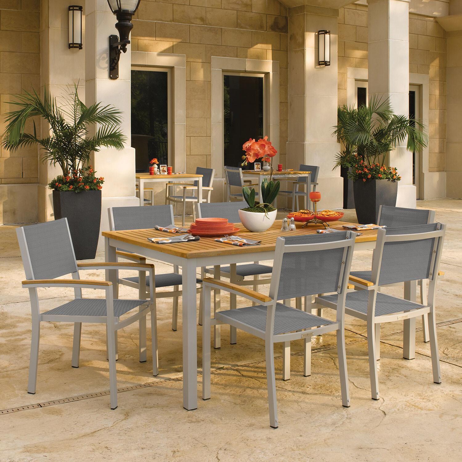 Oxford Garden Travira 7 Piece Flint Aluminum Patio Dining Set W/ Titanium Sling Armchairs & 63-Inch Rectangular Natural Tekwood Table