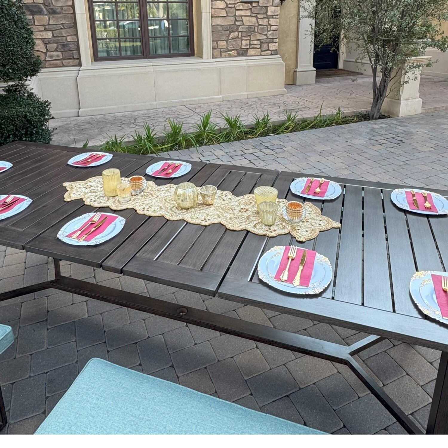 Atlantis 7 Pc Aluminum Dining Set w/ 2 Swivel Rocker Dining Arm Chairs, 4 Two Person Benches & Extension Table in Walnut/Spa by Darlee - Table From Above - Lifestyle thumbnail