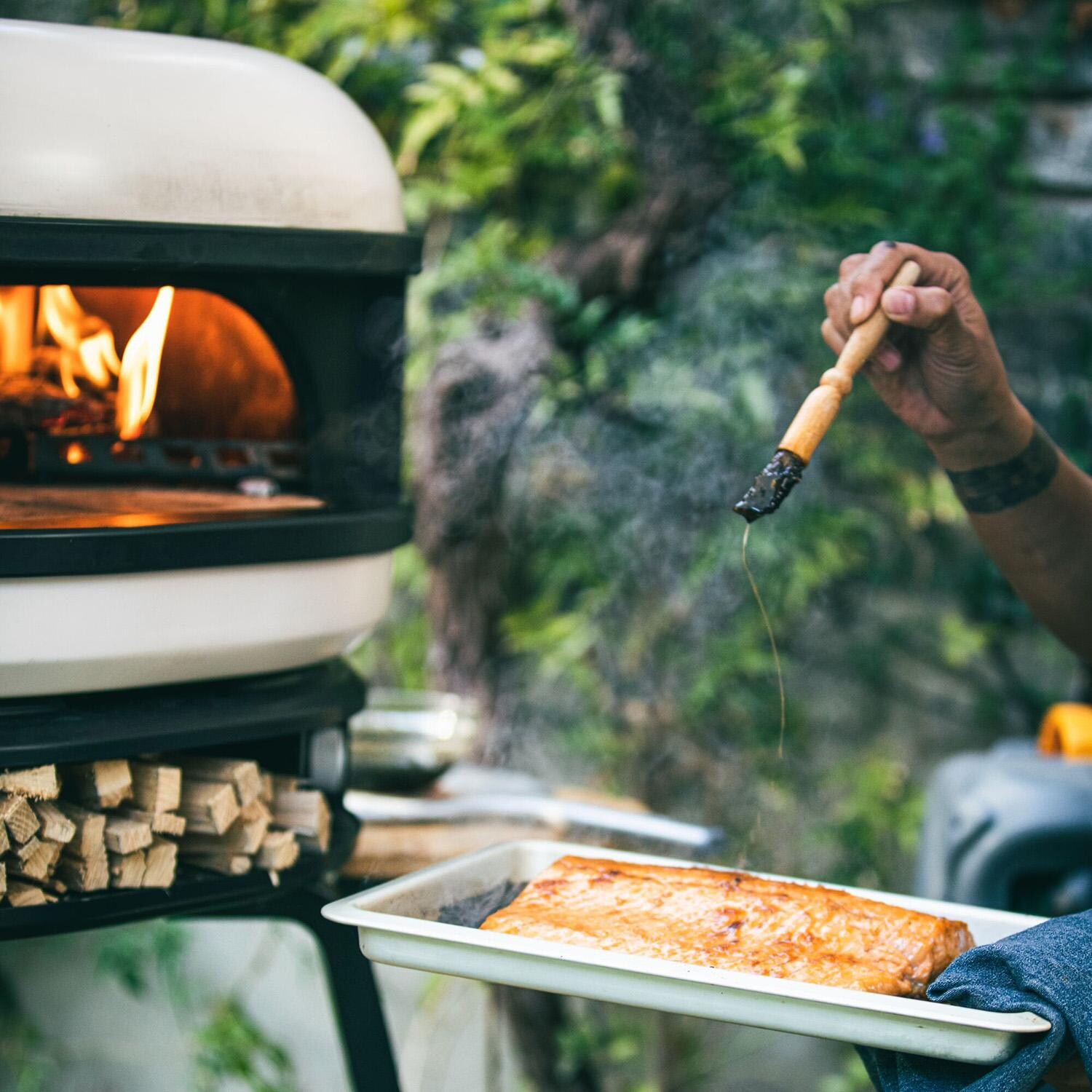 Gozney GDPCMUS1239 Dome Propane Pizza Oven - Bone - Prepping Food - Lifestyle thumbnail