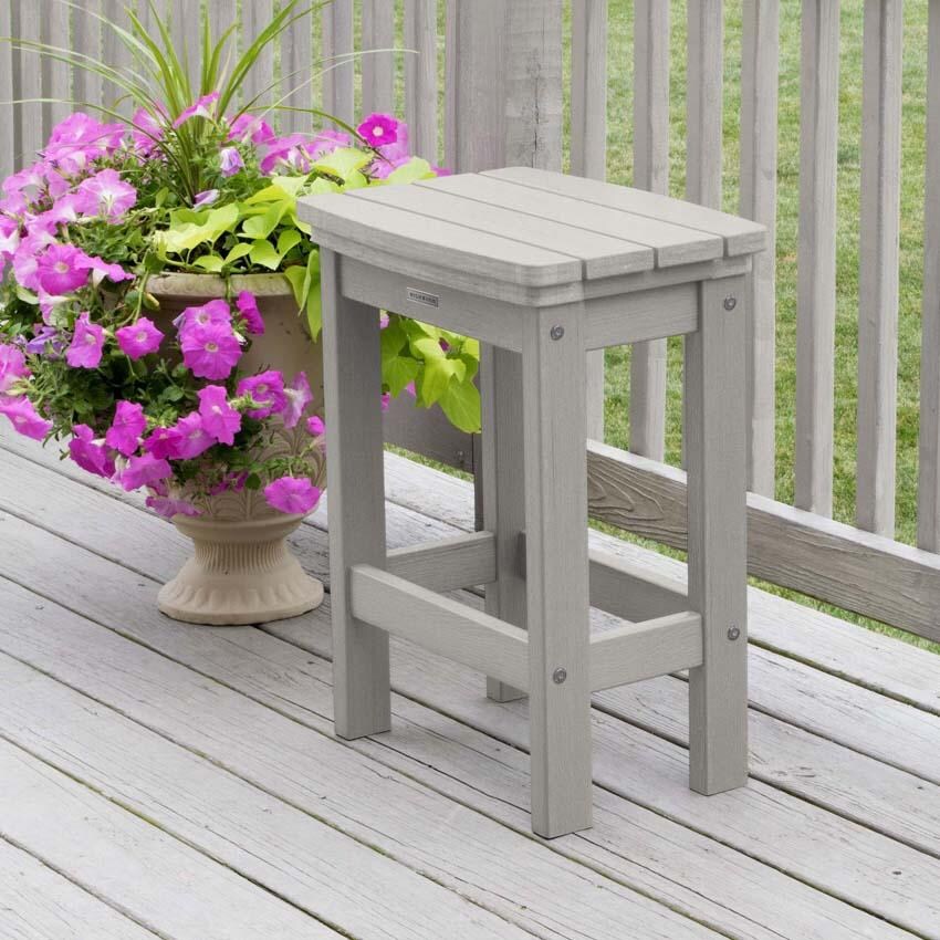 Hart Lane Polyresin Bar Stool Counter Height in Harbor Gray By Lakeview Outdoor Designs - Angled - Lifestyle thumbnail