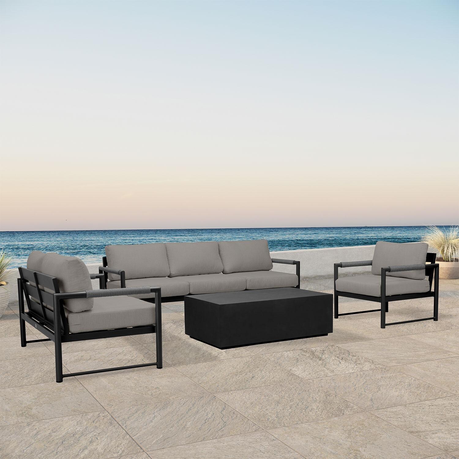 Lakeview AVEBAY-BK-CO-SET137-CC Avenue Bay Black/Carbon 4 Pc Sofa Loveseat Set - Canvas Charcoal - Angled On Patio - Lifestyle thumbnail