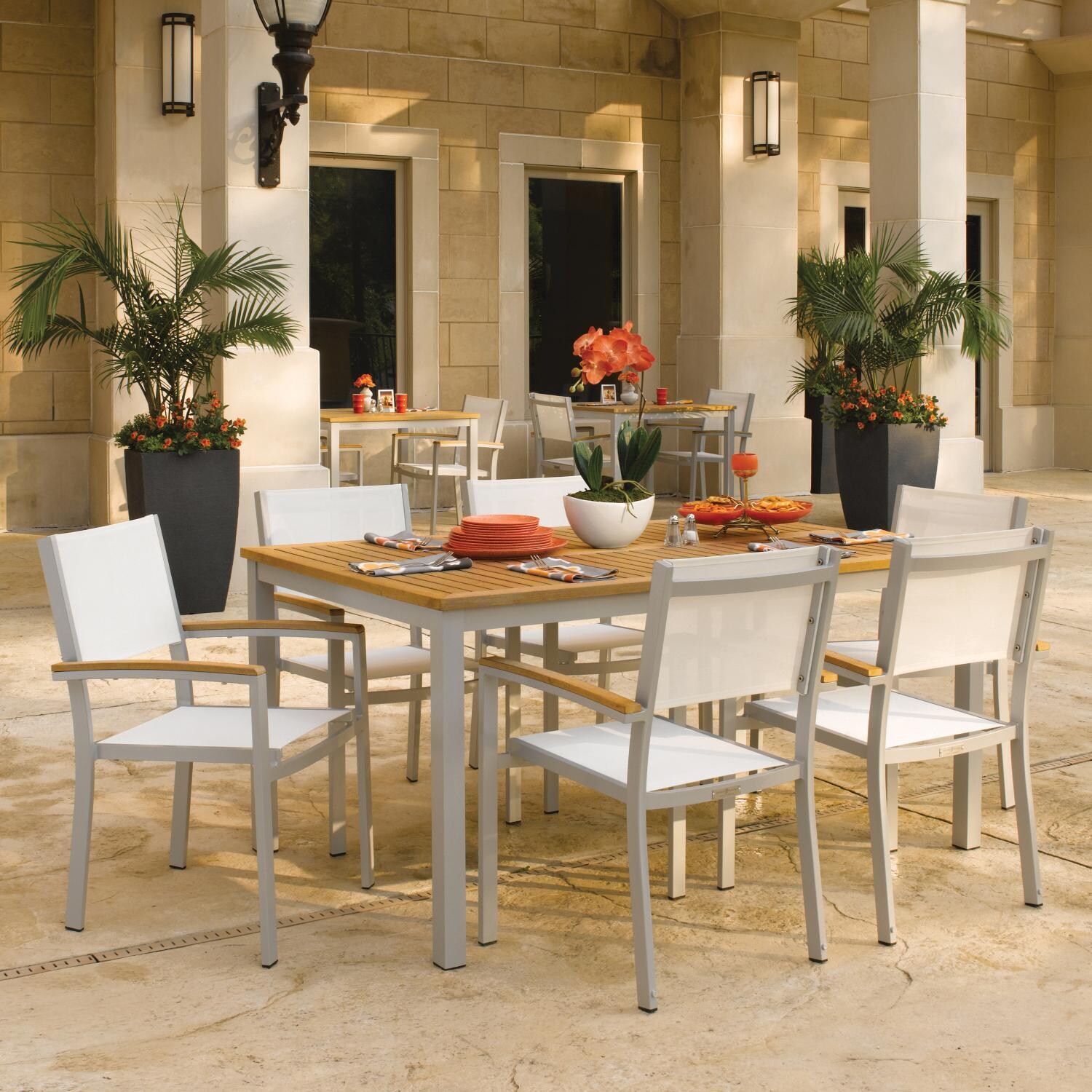 Oxford Garden Travira 7 Piece Flint Aluminum Patio Dining Set W/ Natural Sling Armchairs & 63-Inch Rectangular Natural Tekwood Table thumbnail