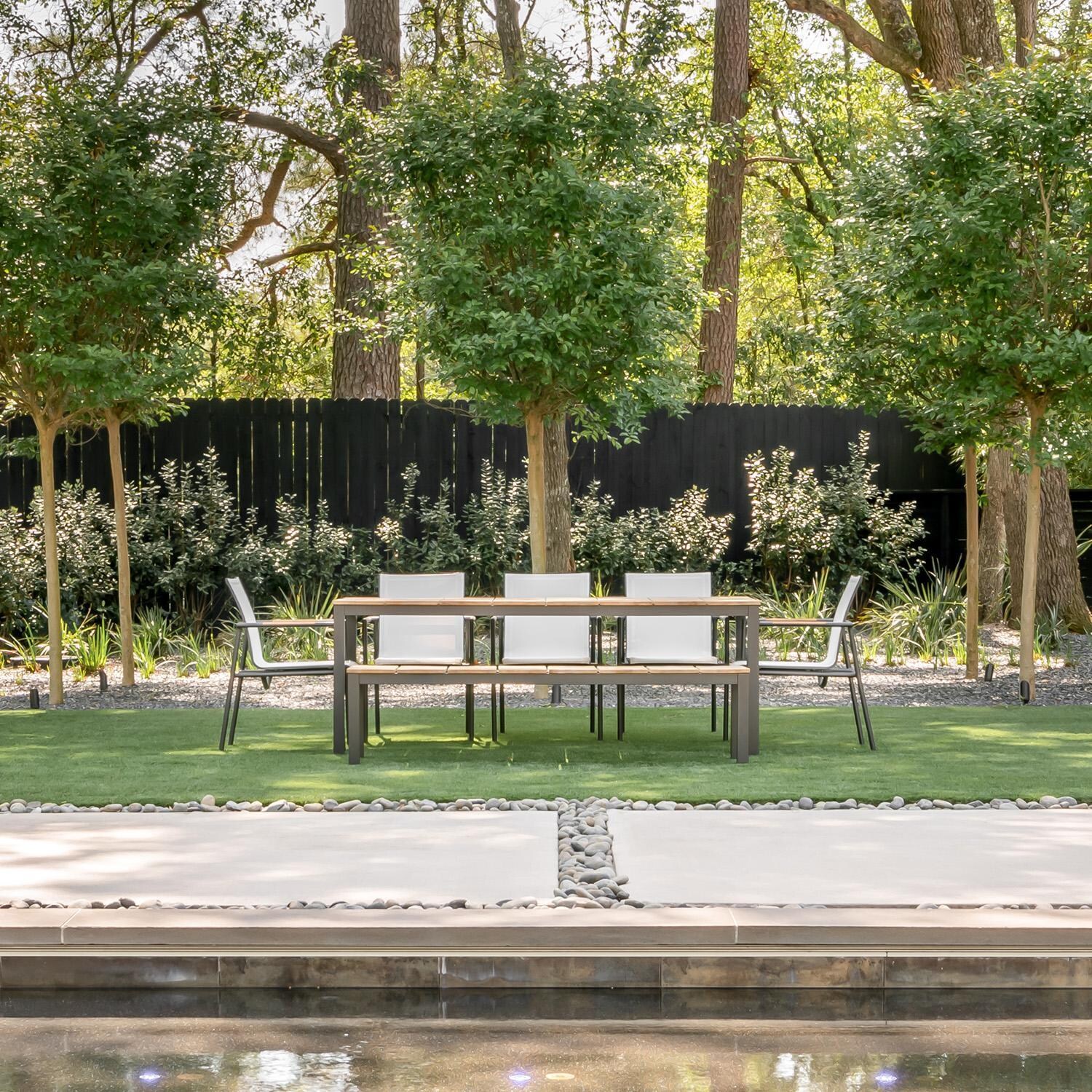 Teak + Table Paros Stacking Dining Chair in Asteroid/White - Poolside - Lifestyle thumbnail
