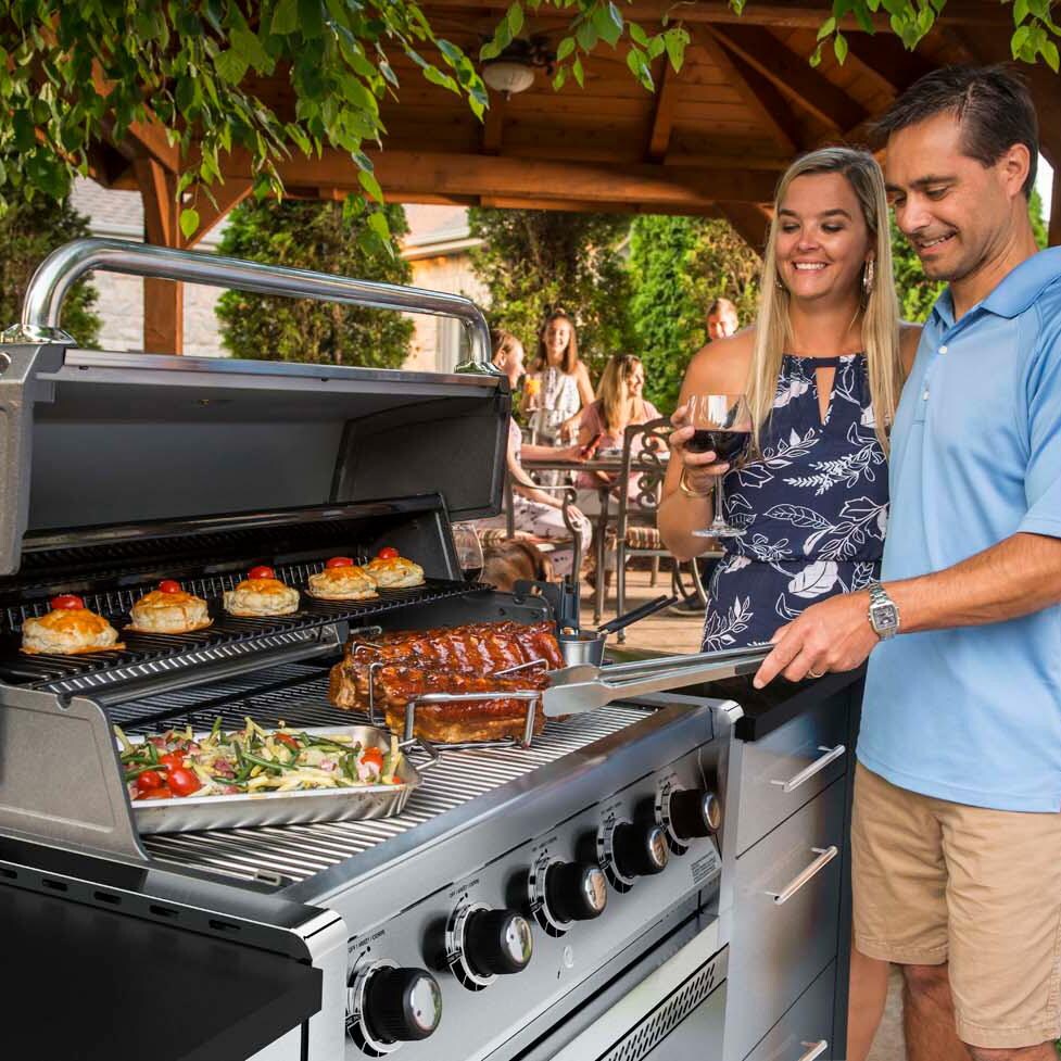 Broil King 886717 Regal S520 5-Burner Built-In Natural Gas Grill - Stainless Steel - At the Grill - Lifestyle thumbnail