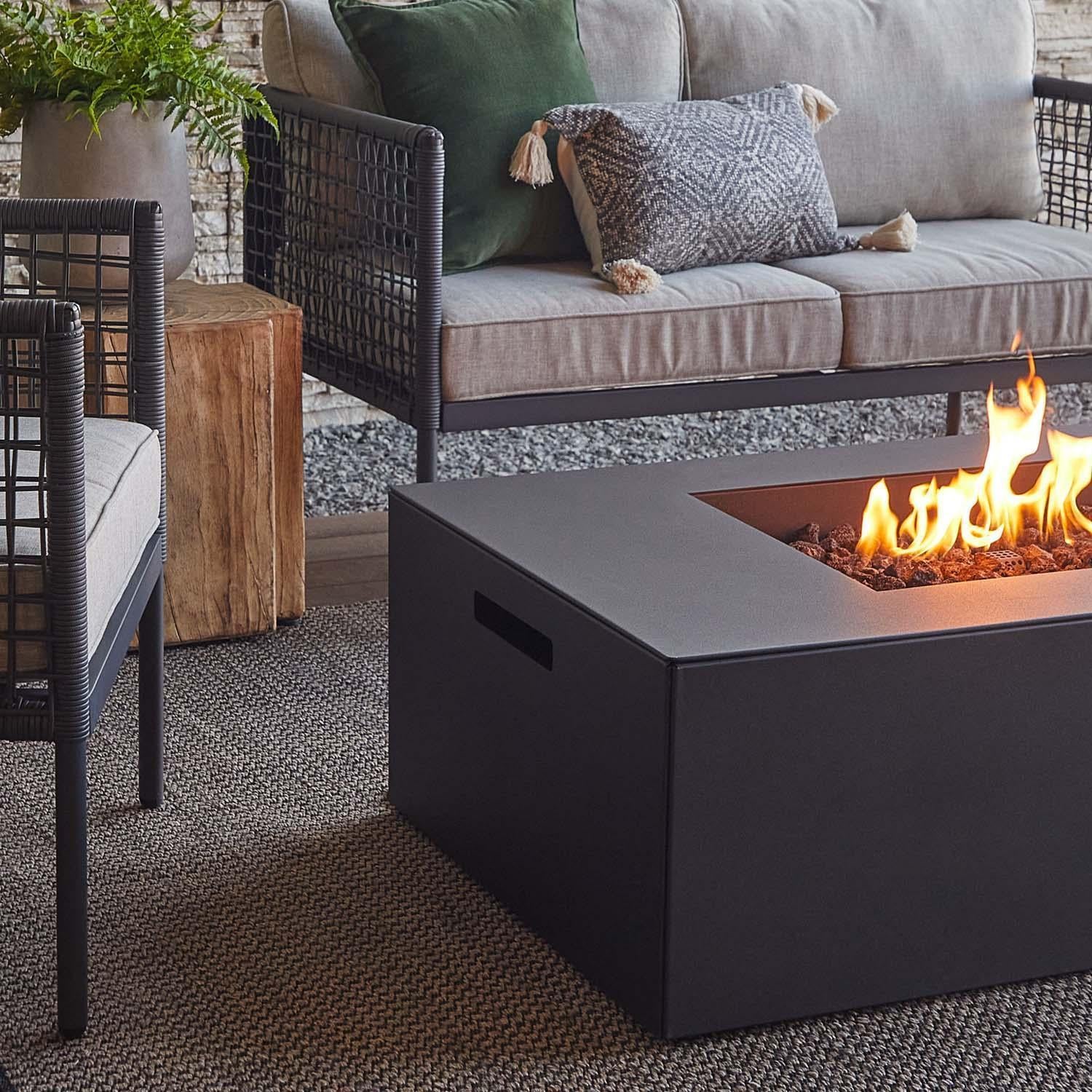 Covewood 58 Inch Rectangular Aluminum Propane Fire Pit Table w/ Hidden Propane Tank in Charcoal by BBQGuys Signature - Side View - Lifestyle thumbnail
