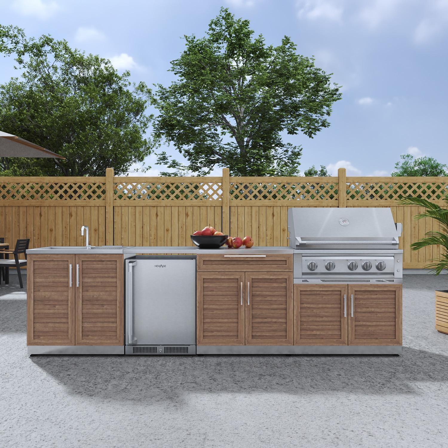 NewAge Products 66377 Classic Series 10 1/2 Ft Outdoor Kitchen Island w/ 36-in Propane Grill, Sink, Refrigerator, Trash Bin, Door & Drawer in Grove/Stainless Steel - On Patio - Lifestyle thumbnail