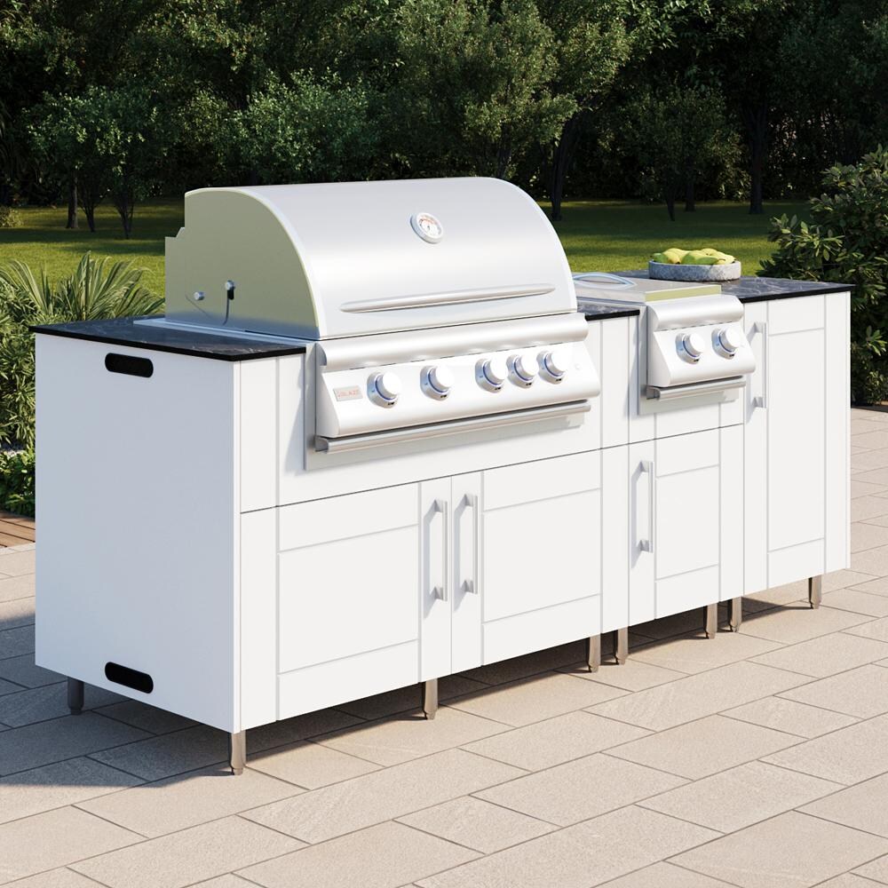 WeatherStrong Abaco 7 Ft Outdoor Kitchen Island w/ Lynx Natural Gas Grill & Side Burner in Shell White/Midnight Ice - On Patio - Lifestyle thumbnail