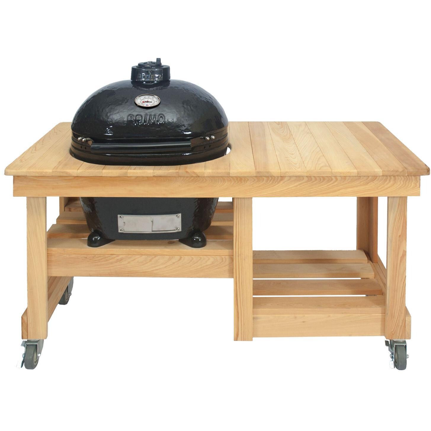 Primo Oval Large Ceramic Charcoal Smoker Grill On Countertop Cypress Table thumbnail