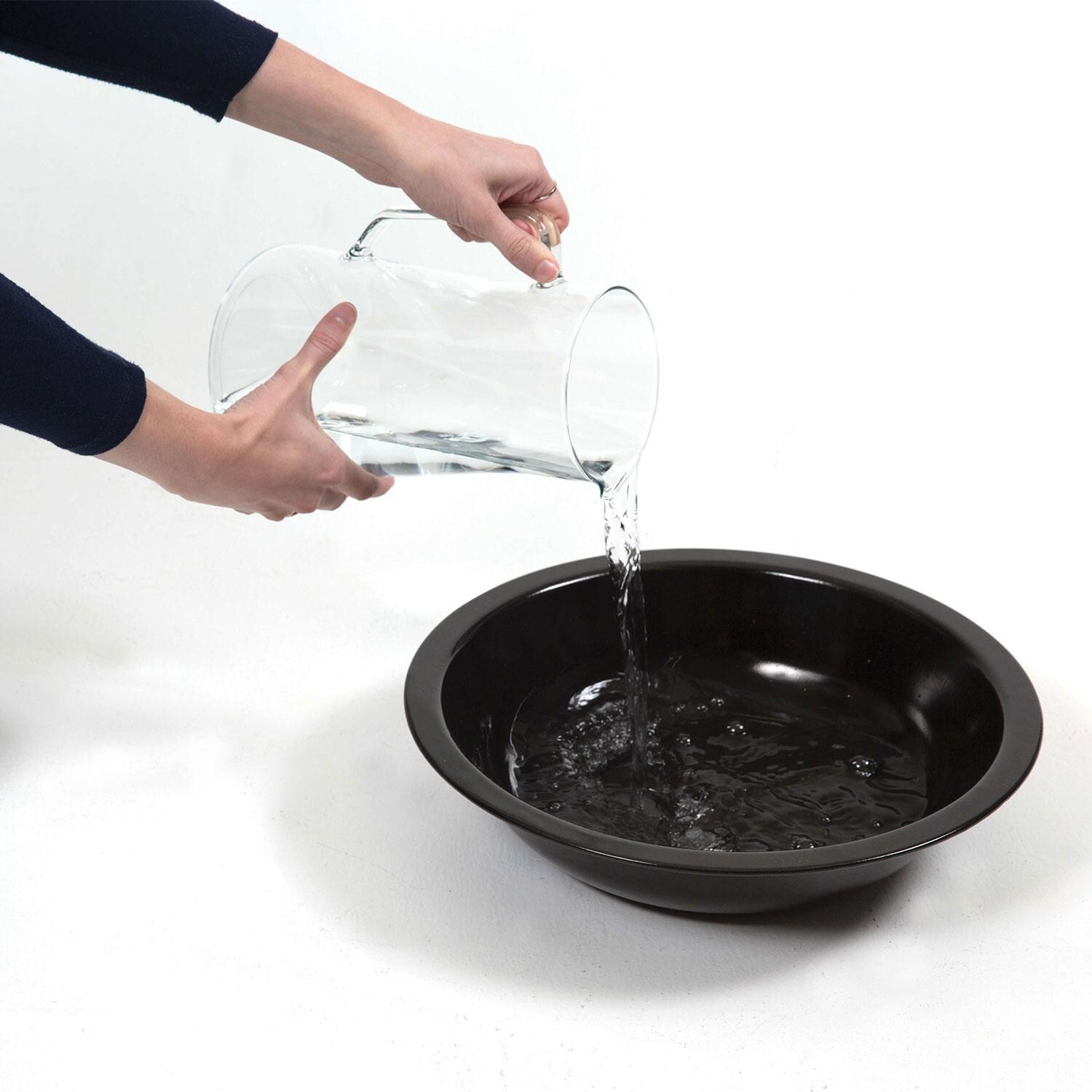 GrillPro 31816 Traditional Charcoal Smoker - Pouring Water Before Inserting Charcoal - Detail thumbnail