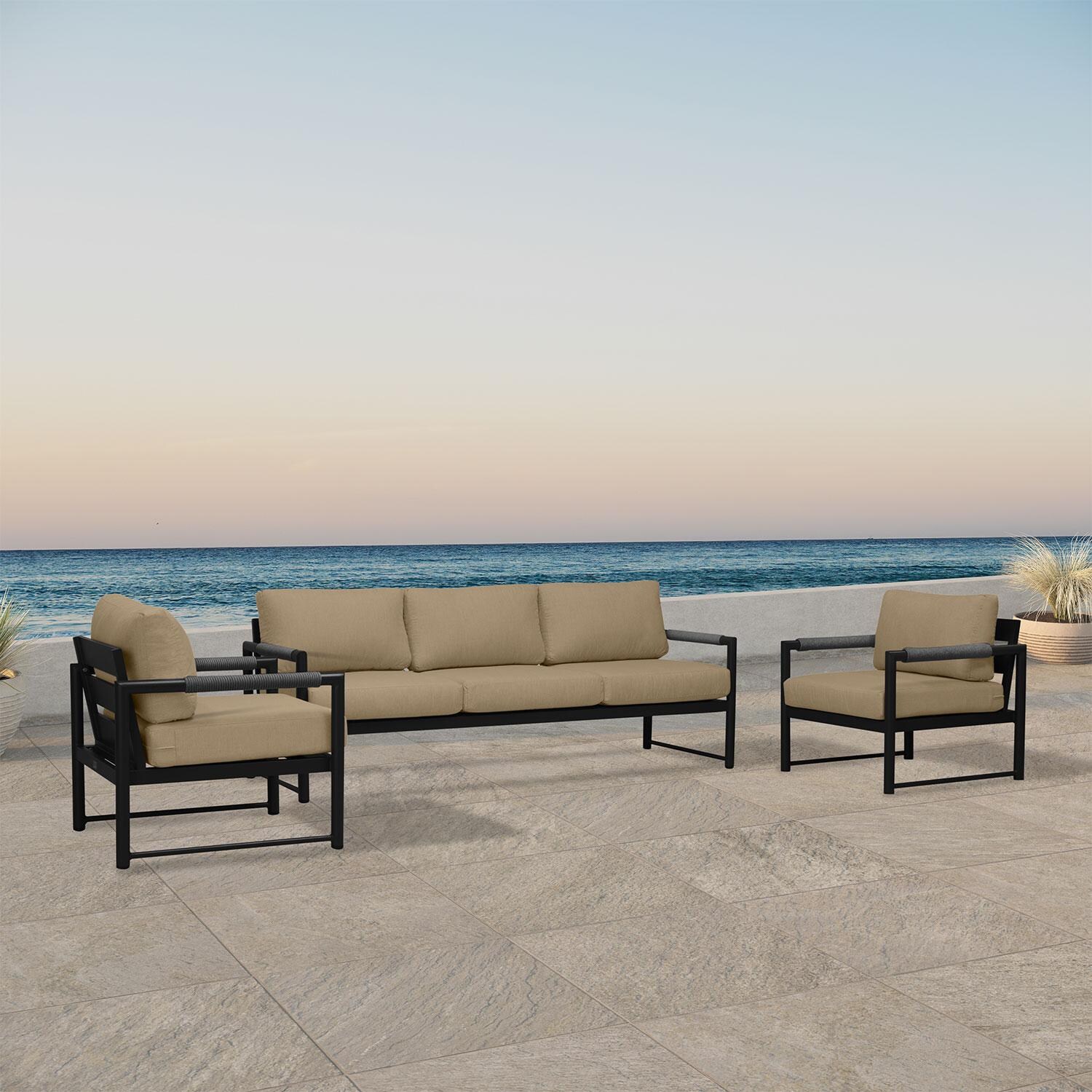 Lakeview AVEBAY-BK-CO-SET141-HB Avenue Bay Black/Carbon 3 Pc Sofa Club Chair - Heather Beige - Angled On Patio - Lifestyle thumbnail