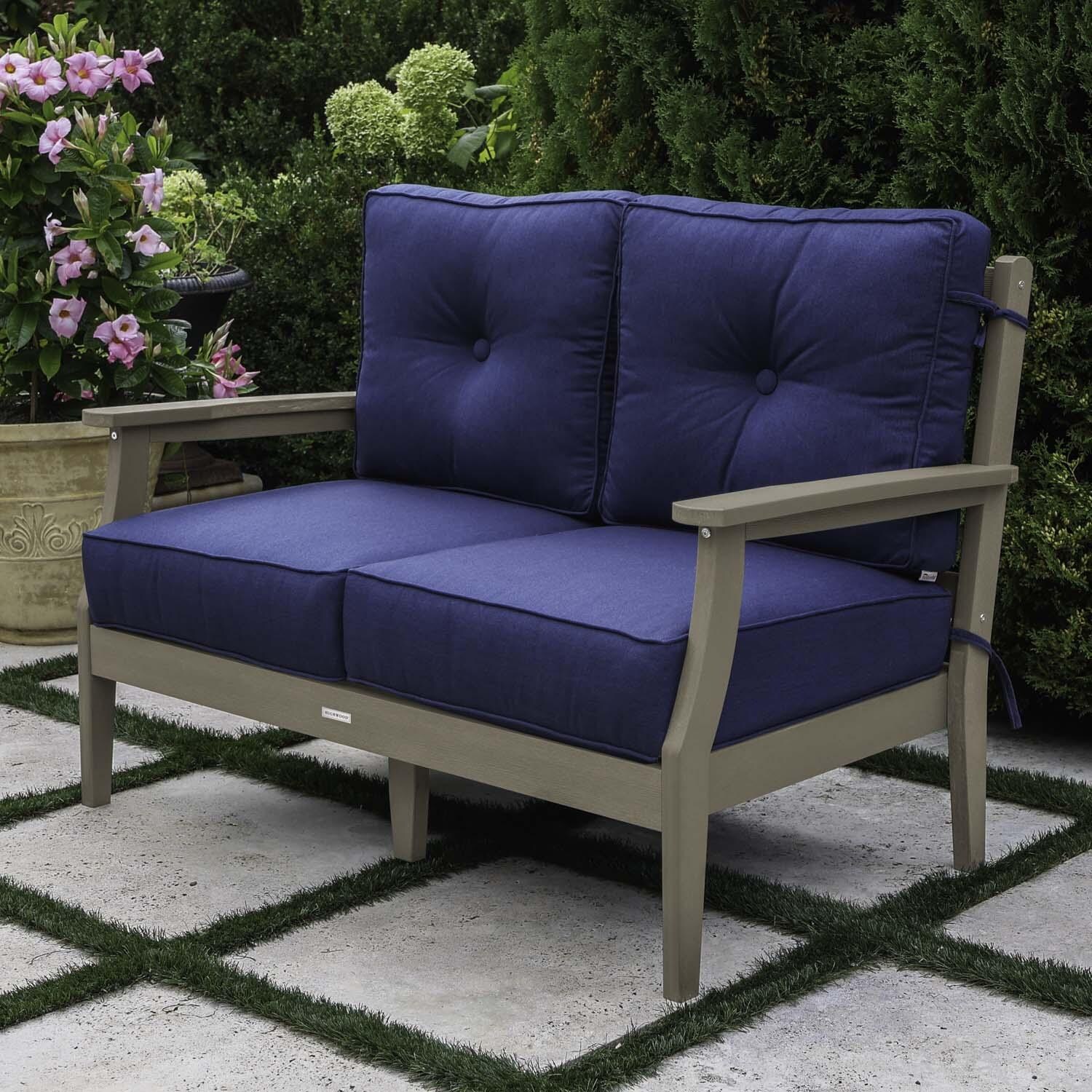 Blushing Bay 2 Person Recycled Plastic Loveseat in Spectrum Indigo/Woodland Brown by Lakeview Outdoor Designs - Right Angled - Lifestyle thumbnail