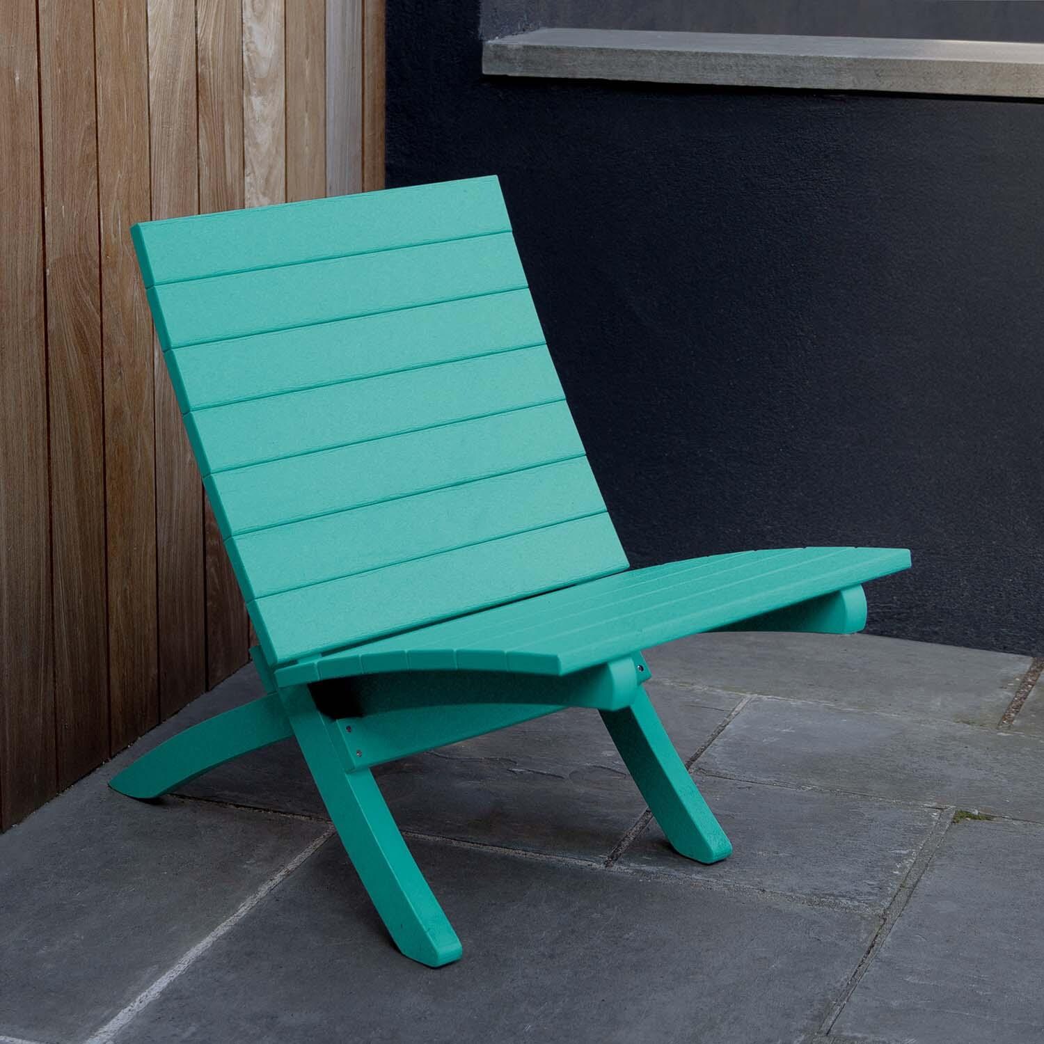Hazel Cove Recycled Plastic Folding & Stacking Dining Side Chair in Seaglass Blue by Lakeview Outdoor Designs - Right Side View - Lifestyle thumbnail